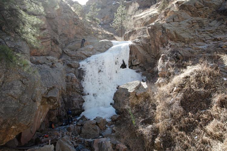 Ice climbers climb up Little Eiger Crag