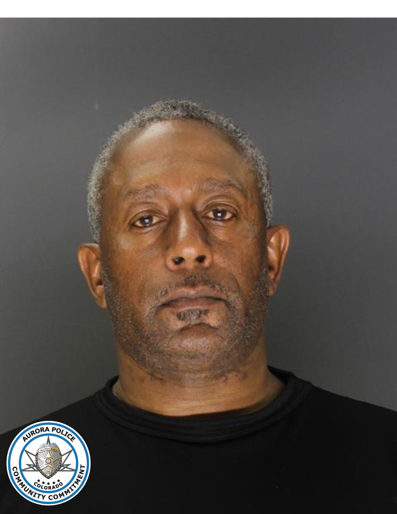 Denver police officer arrested in connection to harassment, domestic violence