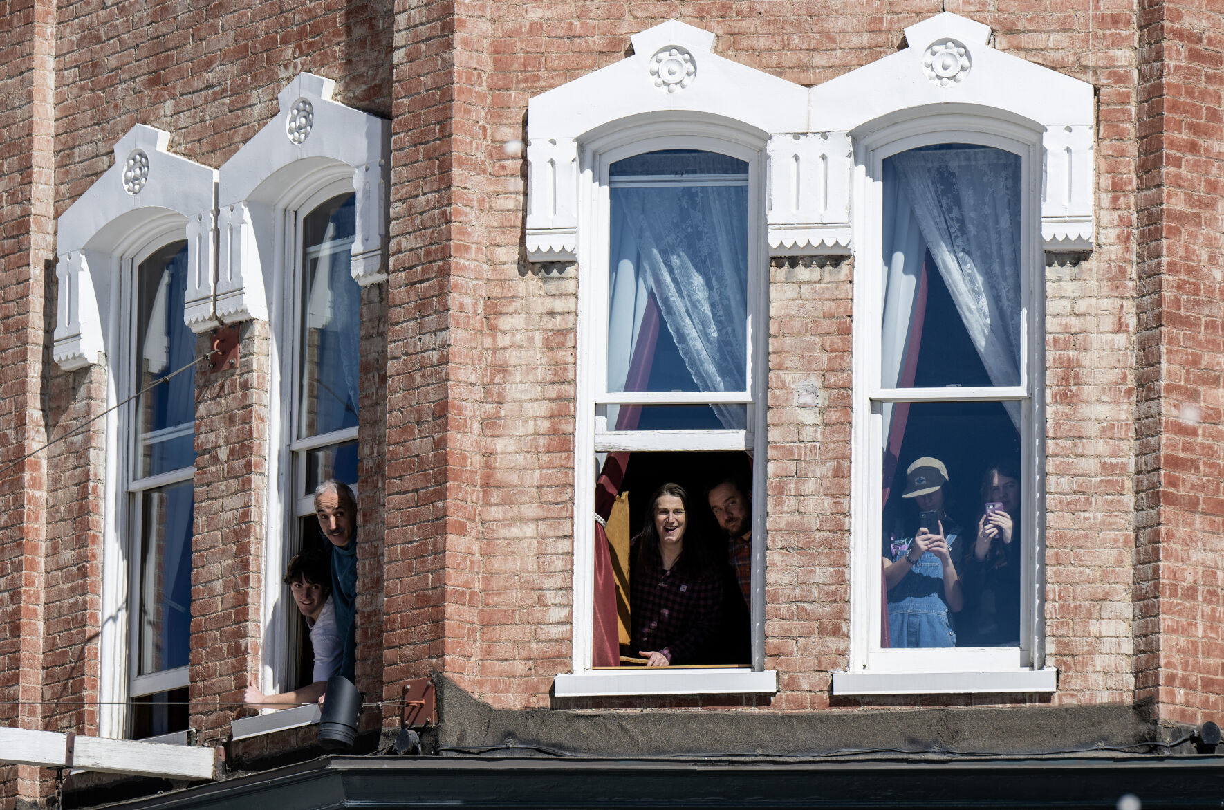 Spectators watch the the 76th Annual Leadville Ski Joring from a second story window on Saturday, March 2, 2024, in Leadville, Colo. (Parker Seibold, The Gazette) (Parker Seibold)