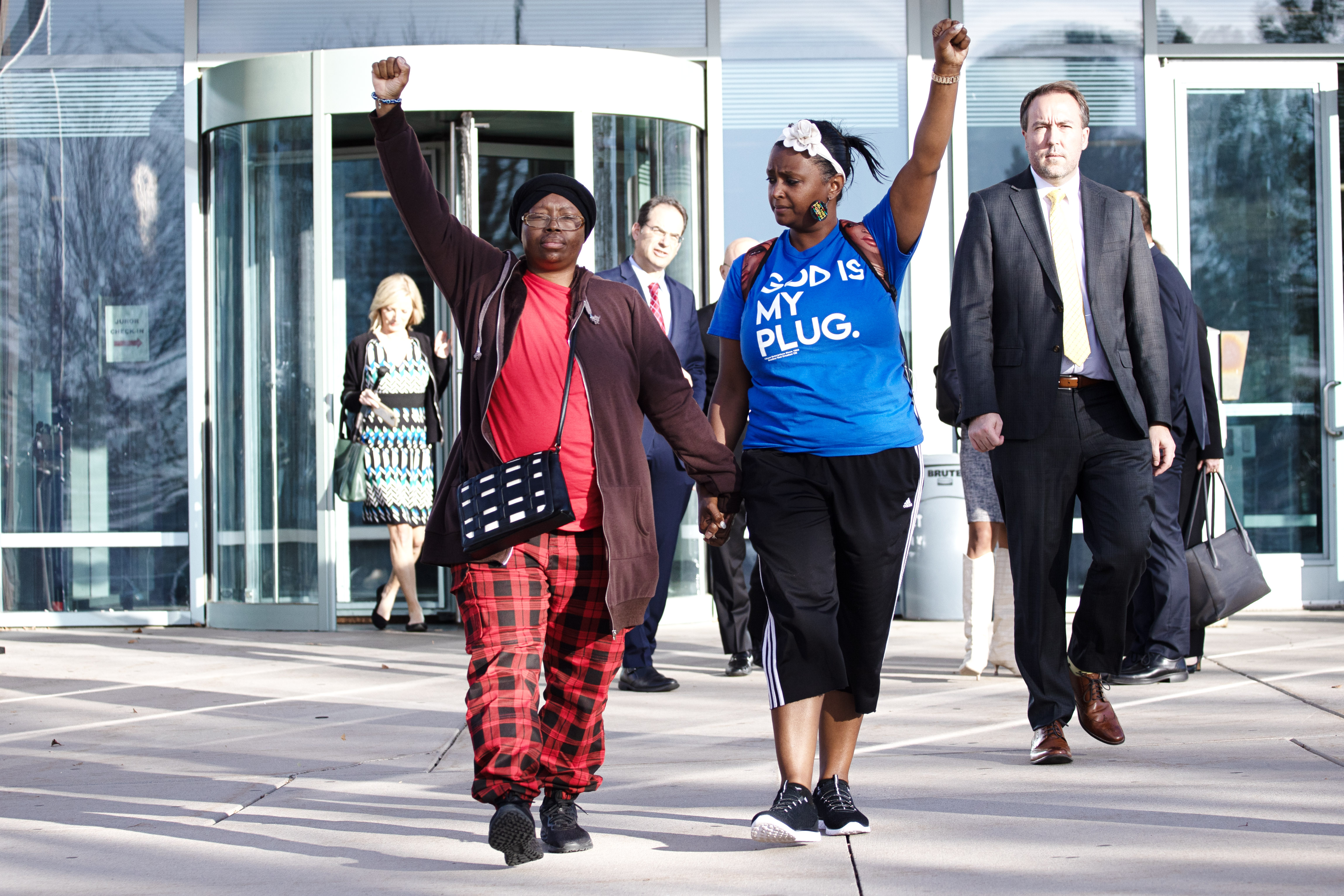 Sheneen McClain, left, and MiDian Holmes emerge with fists raised from the Adams County Court in Brighton, Colo. after Aurora Police Officer Nathan Woodyard was acquitted in the 2019 death of McClain's son, Elijah, on Monday, Nov. 6, 2023 (TomHellauerMultimedia Producertom.hellauer@denvergazette.comhttps://denvergazette.com/content/tncms/avatars/f/9e/622/f9e6228a-3b6b-11ed-bf10-fbb71fa8e421.f54b911252c540f1d61709edc4727a39.png)