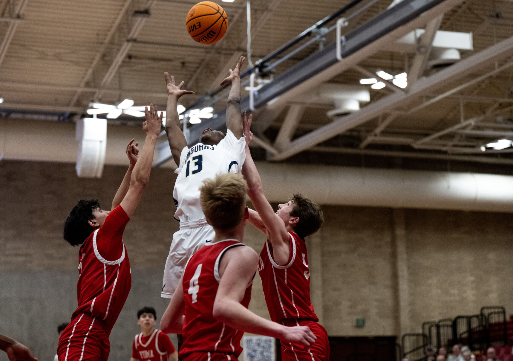 The Vanguard School’s Josh Alade (13) gains possession of a rebound in the first half of the 3A boys basketball state championships against Yuma on Saturday, March 9, 2024, at the University of Denver’s Hamilton Gym in Denver. (Parker Seibold, The Gazette) (Parker Seibold)