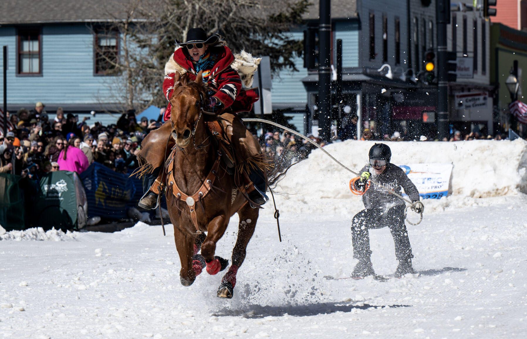 A horse and rider pull a skier through the course at the 76th Annual Leadville Ski Joring on Saturday, March 2, 2024, in Leadville, Colo. (Parker Seibold, The Gazette) (Parker Seibold)