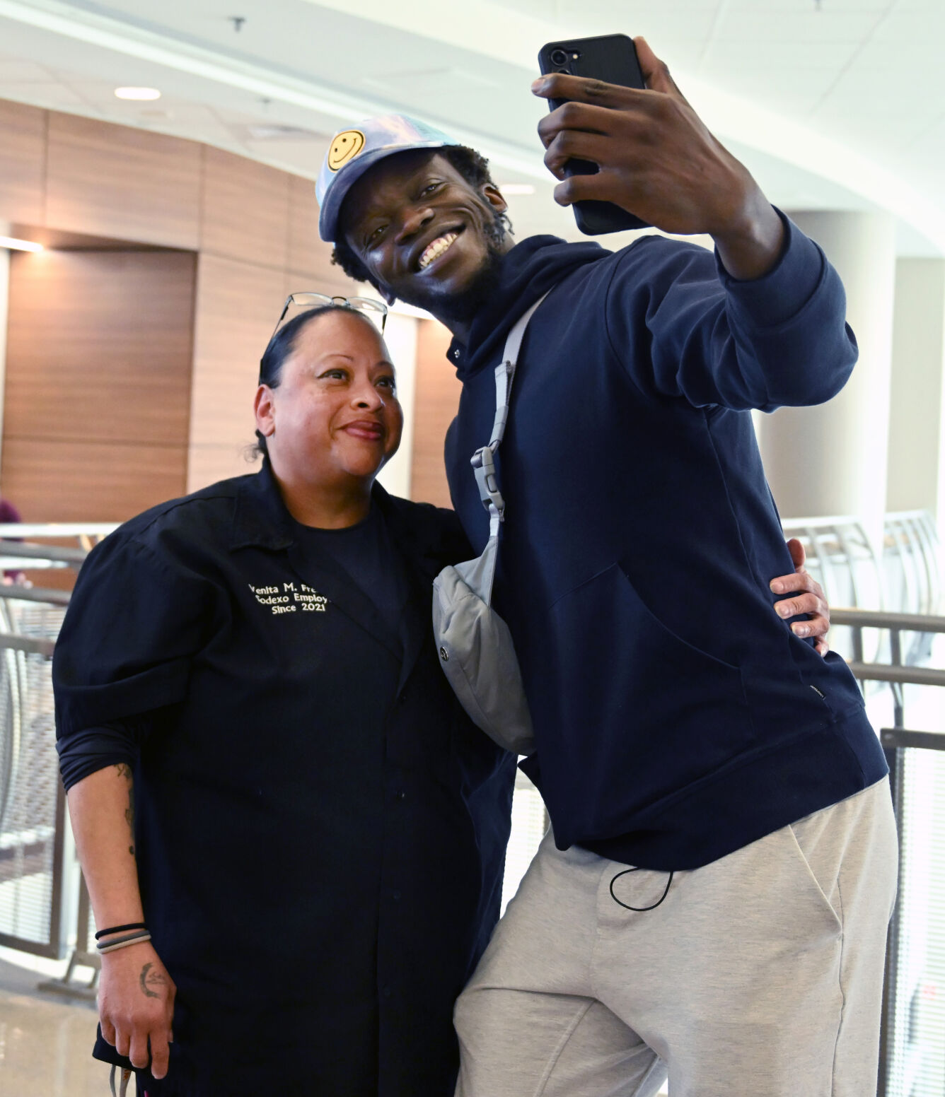 Reggie Jackson poses with employees at UCHealth Memorial Hospital North on Thursday, March 27, 2024. (Photo by Jerilee Bennett, The Gazette)