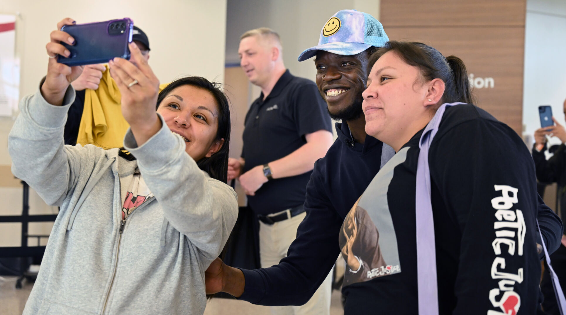 Reggie Jackson poses with visitors at UCHealth Memorial Hospital North on Thursday, March 27, 2024. (Photo by Jerilee Bennett, The Gazette)