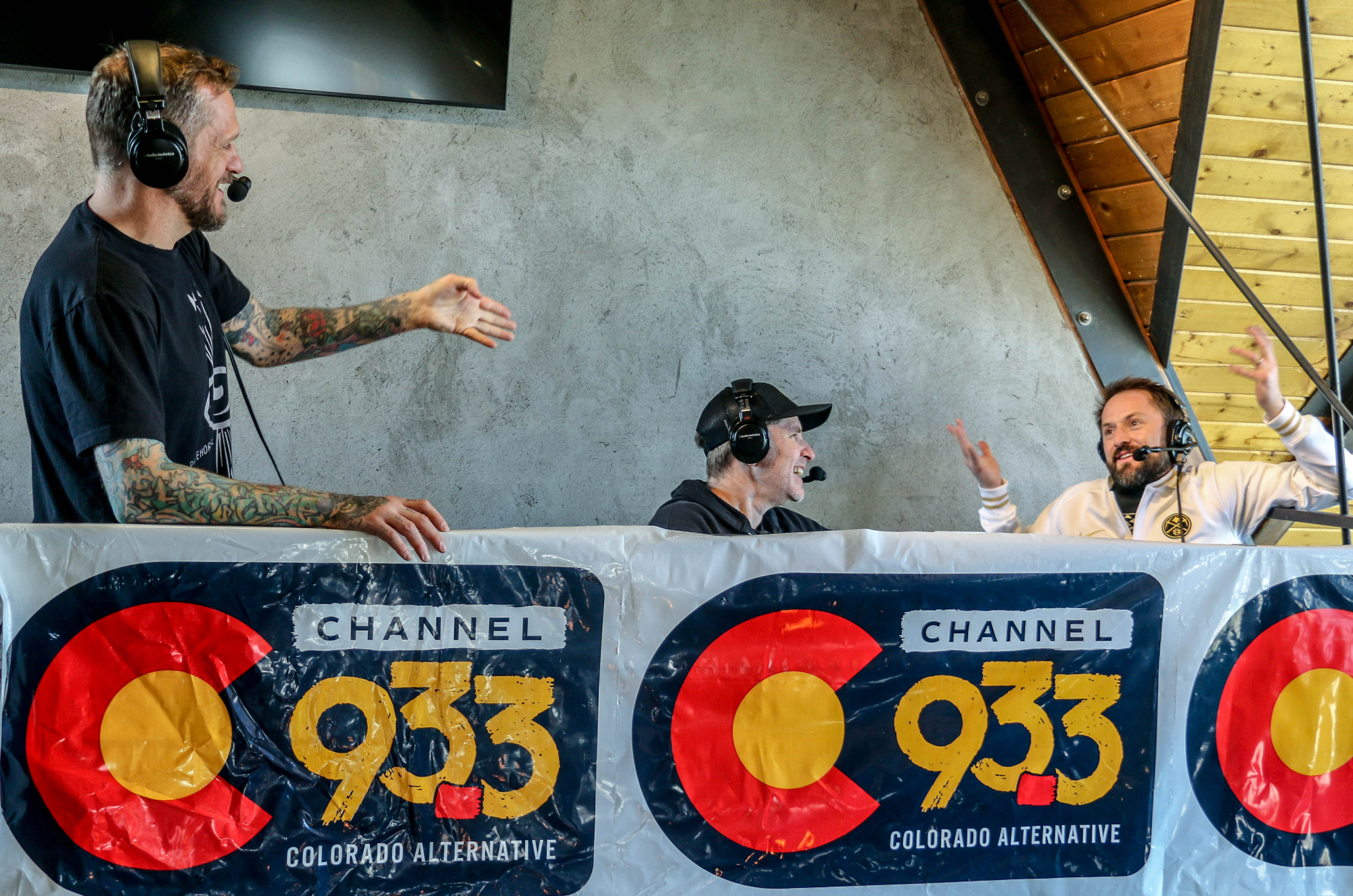 The Grawlix did a takeover of radio station 93.3 on March 3, otherwise known as 303 Day in Colorado. From left, Ben Roy, Andrew Orvedahl and Adam Cayton-Holland broadcasting from Illegal Pete's on Colfax Avenue. (John Moore, The Denver Gazette)