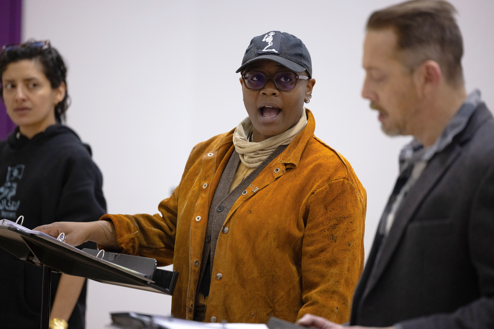 From left, actors Janice Amaya, CG and Christopher Halladay perform 