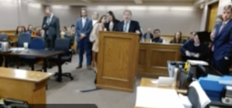 Yeva Smilianska speaks to 20th District Judge Patrick Butler through an interpreter in a Boulder County courtroom. This is screen shot of Friday's hearing in the death of Boulder teen cyclist champion Magnus White. The arraignment was delayed until May 24. (Carol McKinley)