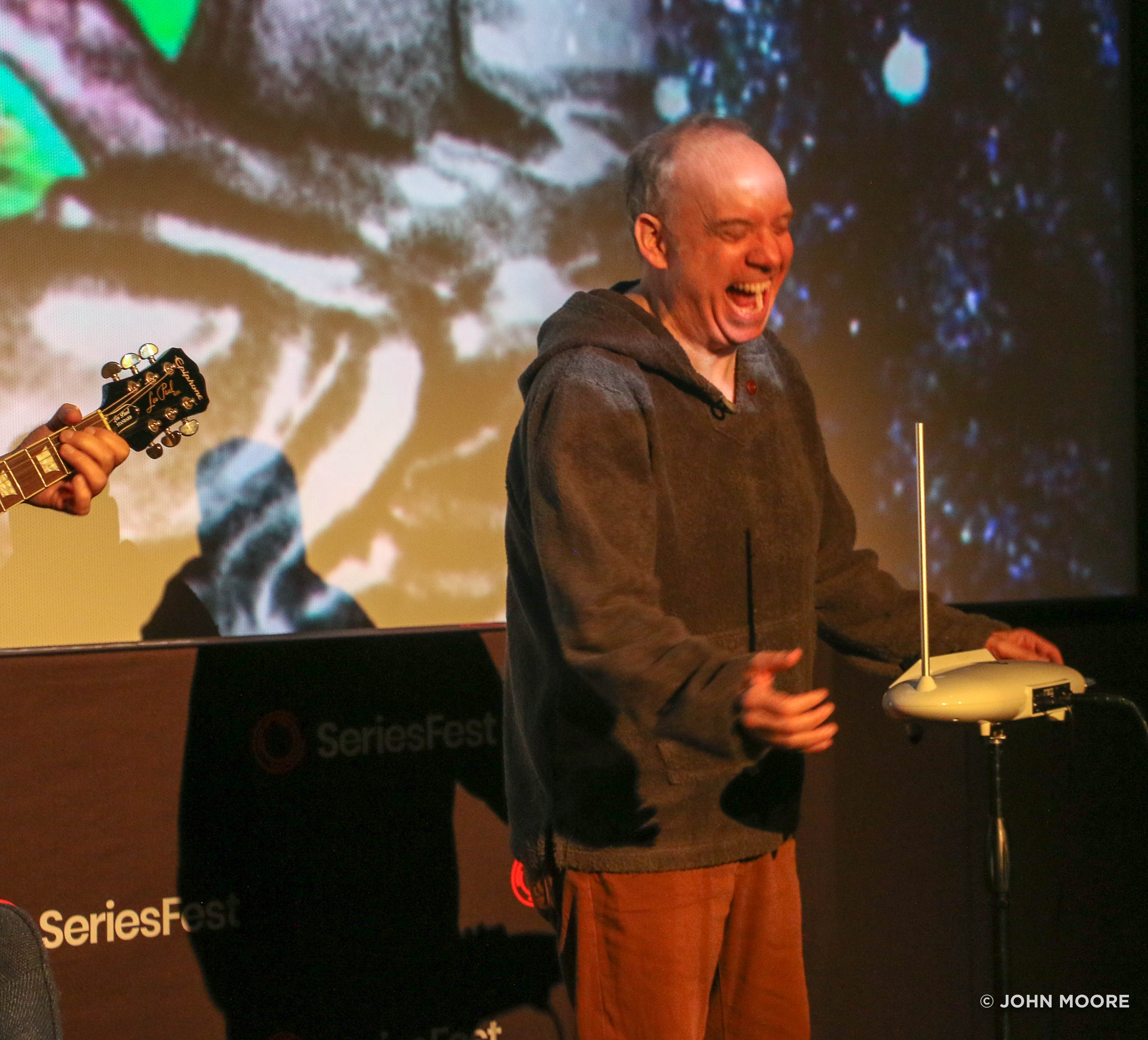 “Chinwag,” a live taping of a podcast hosted by actor Paul Giamatti (playing the theramin) and professor Stephen Asma at SeriesFest 2023 in Denver. (John Moore, The Denver Gazette)