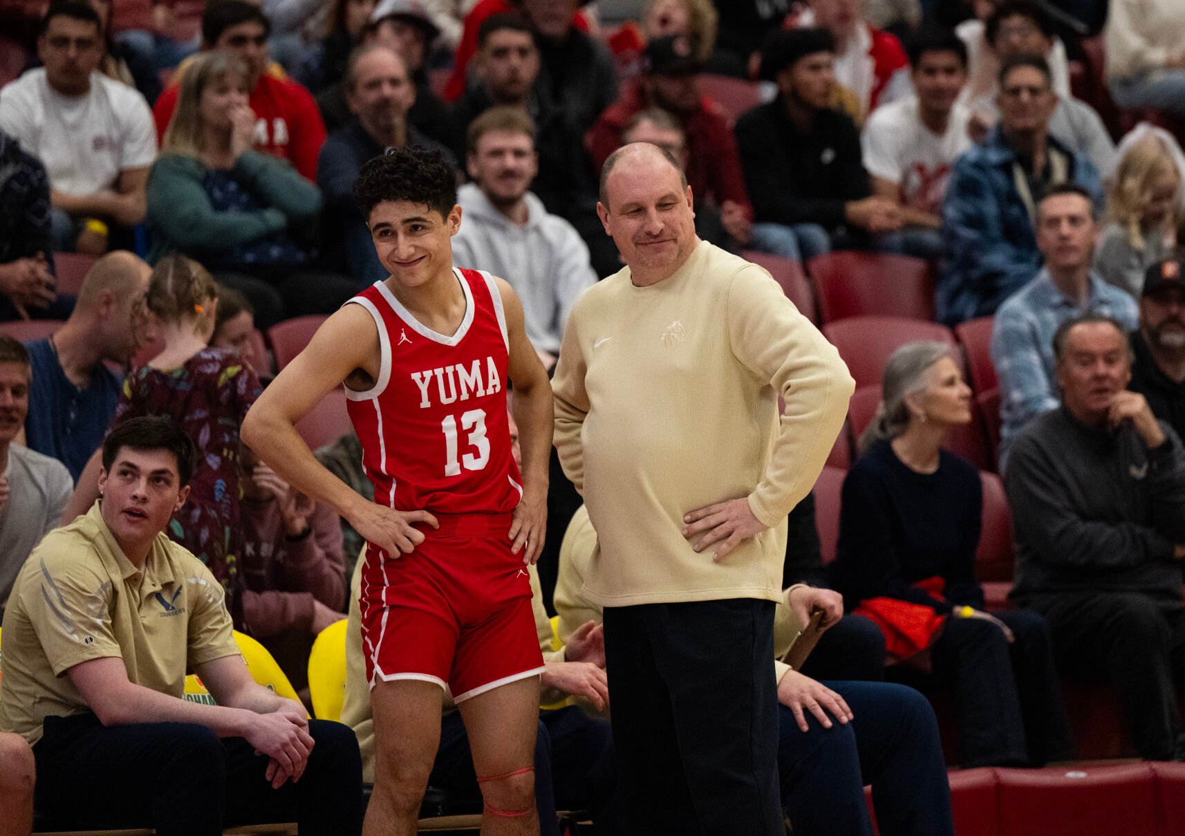 Vanguard head coach Joe Wetters and Yuma’s Cristian Duarte smirk away from each other after Wetters disagreed with a call in Yuma’s favor in the second half of the 3A boys basketball state championships on Saturday, March 9, 2024, at the University of Denver’s Hamilton Gym in Denver. (Parker Seibold, The Gazette) (Parker Seibold)