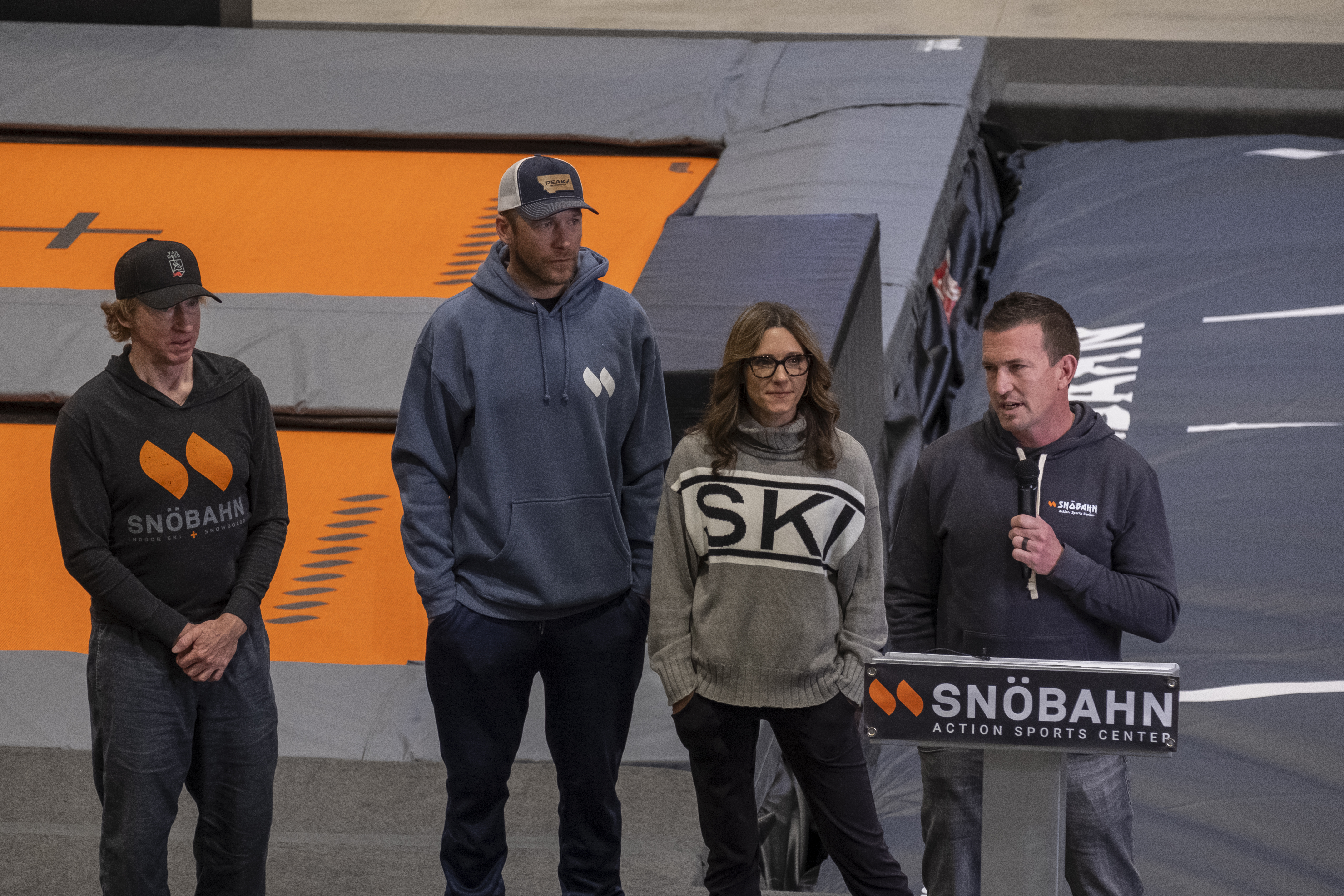 Snöbahn CEO Sadler Merrill, right, Snöbahn Director of Sales and Marketing Gina Merrill and pro skiers Bode Miller, second from the left, and Chris Anthony, left, listen to Merrill speak during the Snöbahn Thornton grand opening ceremony Friday, March 8, 2024, in Thornton, Colorado. (JonathanIngrahamDigital Strategistjonathan.ingraham@denvergazette.comhttps://denvergazette.com/content/tncms/avatars/c/dd/7f0/cdd7f086-b693-11ec-b373-bba598953eb6.fc0f5608a6f1144f64f080f771bd904d.png)