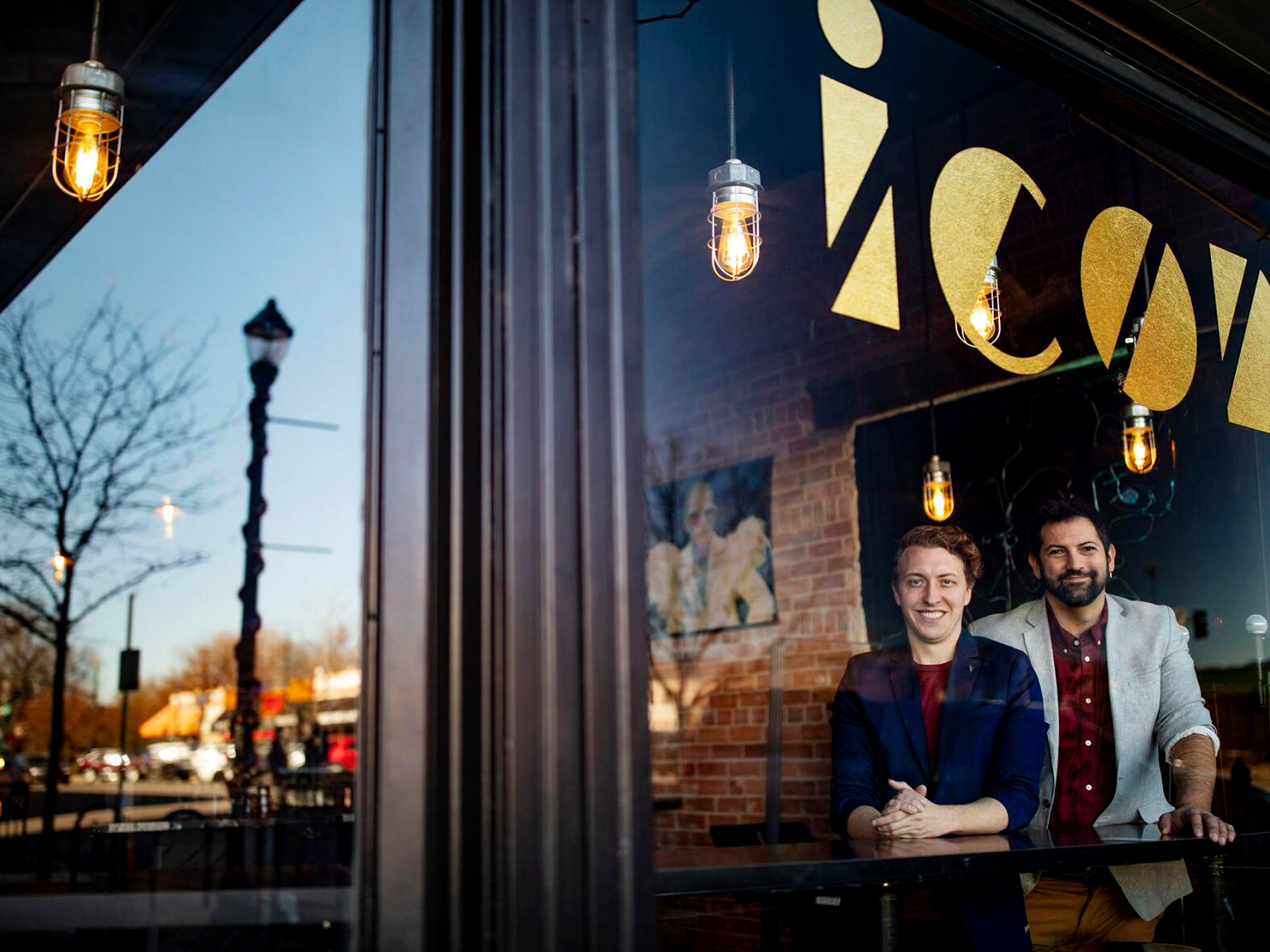 John T. Wolfe, left, and husband Josh Franklin opened Icons, now Colorado Springs' only gay bar in November 2023. After losing the space to a fire, the couple hopes to raise $500,000 and reopen in a new location this August. (Colorado Springs Gazette file photo)