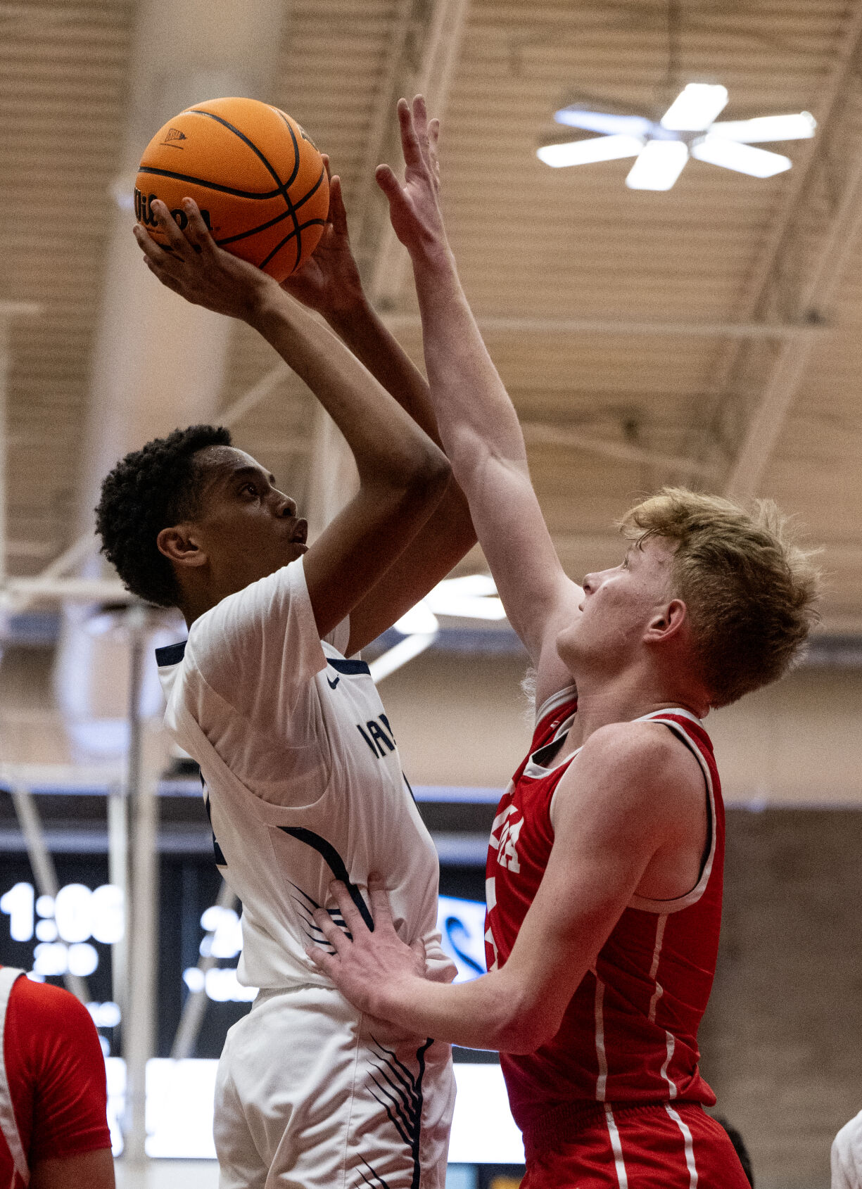 Vanguard’s Matty Dessalegn (0) is blocked by Yuma’s Jonathan Thomson (4) as he takes a shot the first half of the 3A boys basketball state championships on Saturday, March 9, 2024, at the University of Denver’s Hamilton Gym in Denver. (Parker Seibold, The Gazette) (Parker Seibold)