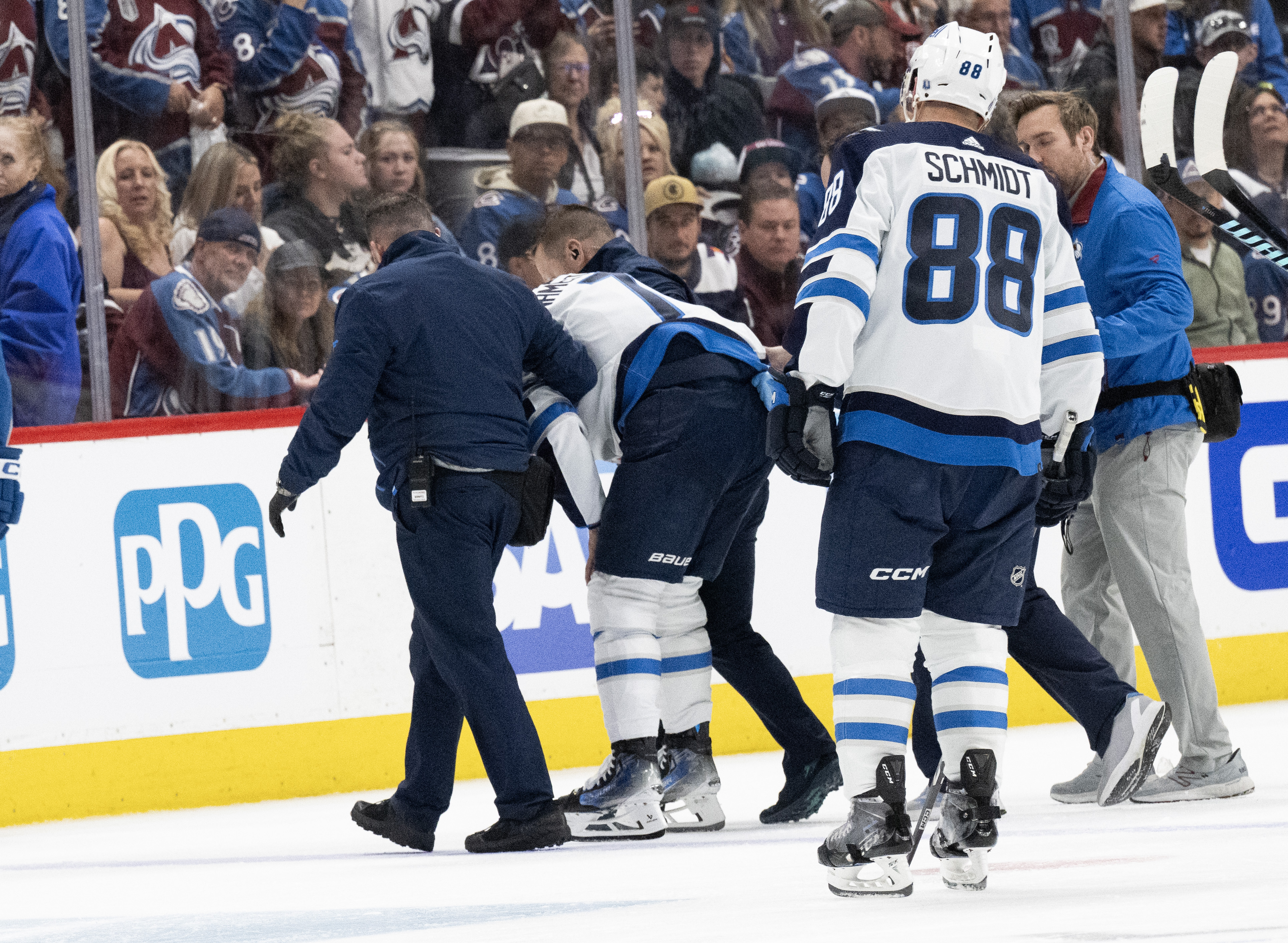 Winnipeg Jets center Vladislav Namestnikov (7) is helped off the ice after taking a puck to the face during the third period in Game 4 of an NHL Stanley Cup first-round playoff series Sunday, April 28, 2024, at Ball Arena in Denver. The Avalanche won 5-1 to take a 3-1 advantage in the series. (The Gazette, Christian Murdock) (Christian Murdock/The Gazette)