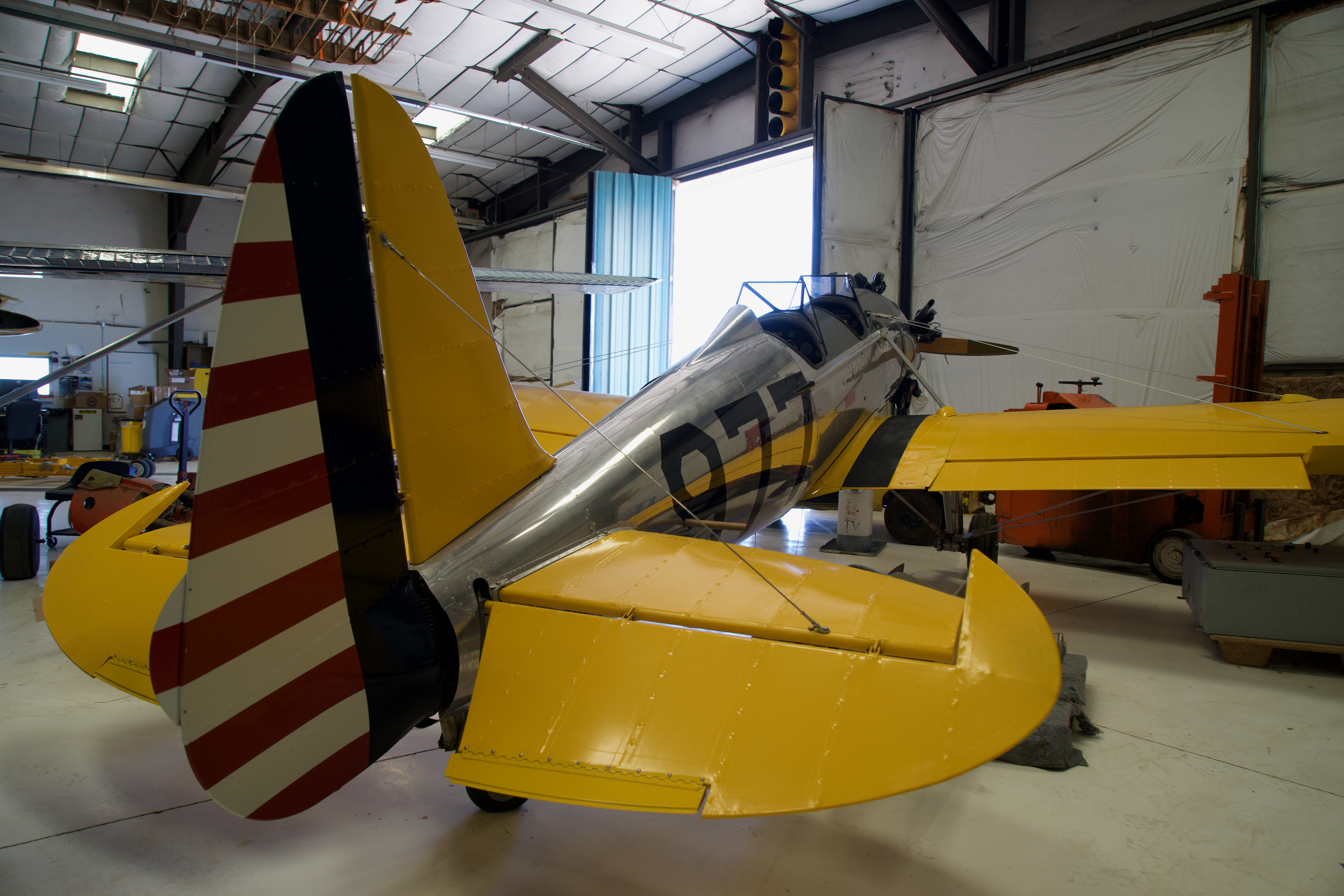 A vintage U.S. Army Air Corps — the entity that precede the United States Air Force — training aircraft sits in its hangar at the Boulder Municipal Airport. This specific hangar is often used for community events like the 1940s Ball, movie nights and often hosts the Boulder chapter of the Experimental Aviation Association as well as their Young Eagles program. The Young Eagles program seeks to get people interested in a career in aviation, whether inside the cockpit or on the ground maintaining aircraft. (Alex Edwards/The Denver Gazette) (AlexanderEdwardsBusiness Reporteralex.edwards@gazette.comhttps://secure.gravatar.com/avatar/dbaa50cc8a9183e280c297e3afa72ace?d=mm&r=g)