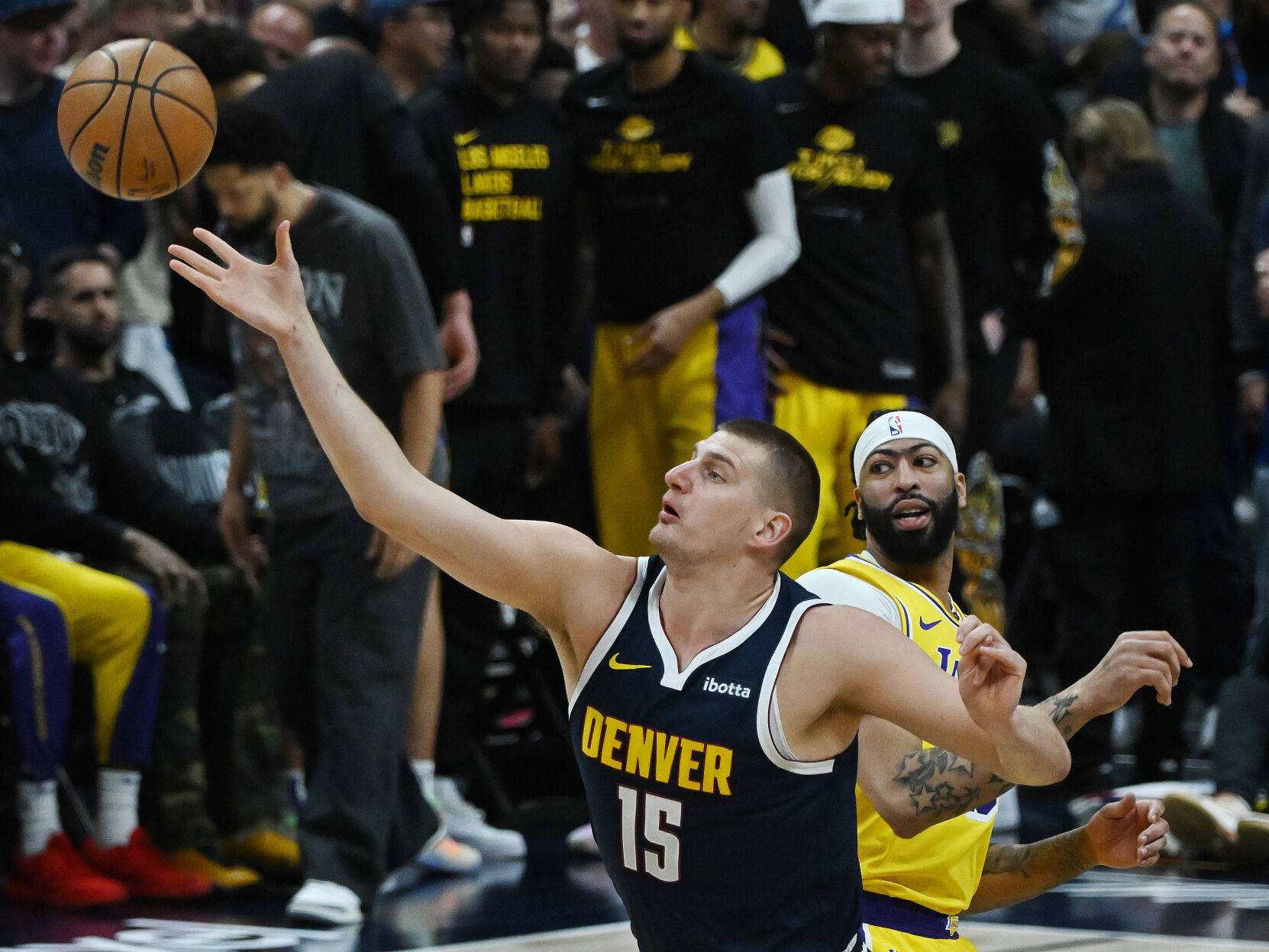 Nikola Jokic directs the ball after the tipoff during game 5 of the first round of the Western Conference championships at Ball Arena on Monday, April 24, 2024. The Nuggets won the game 108-106. (Photo by Jerilee Bennett, The Gazette)