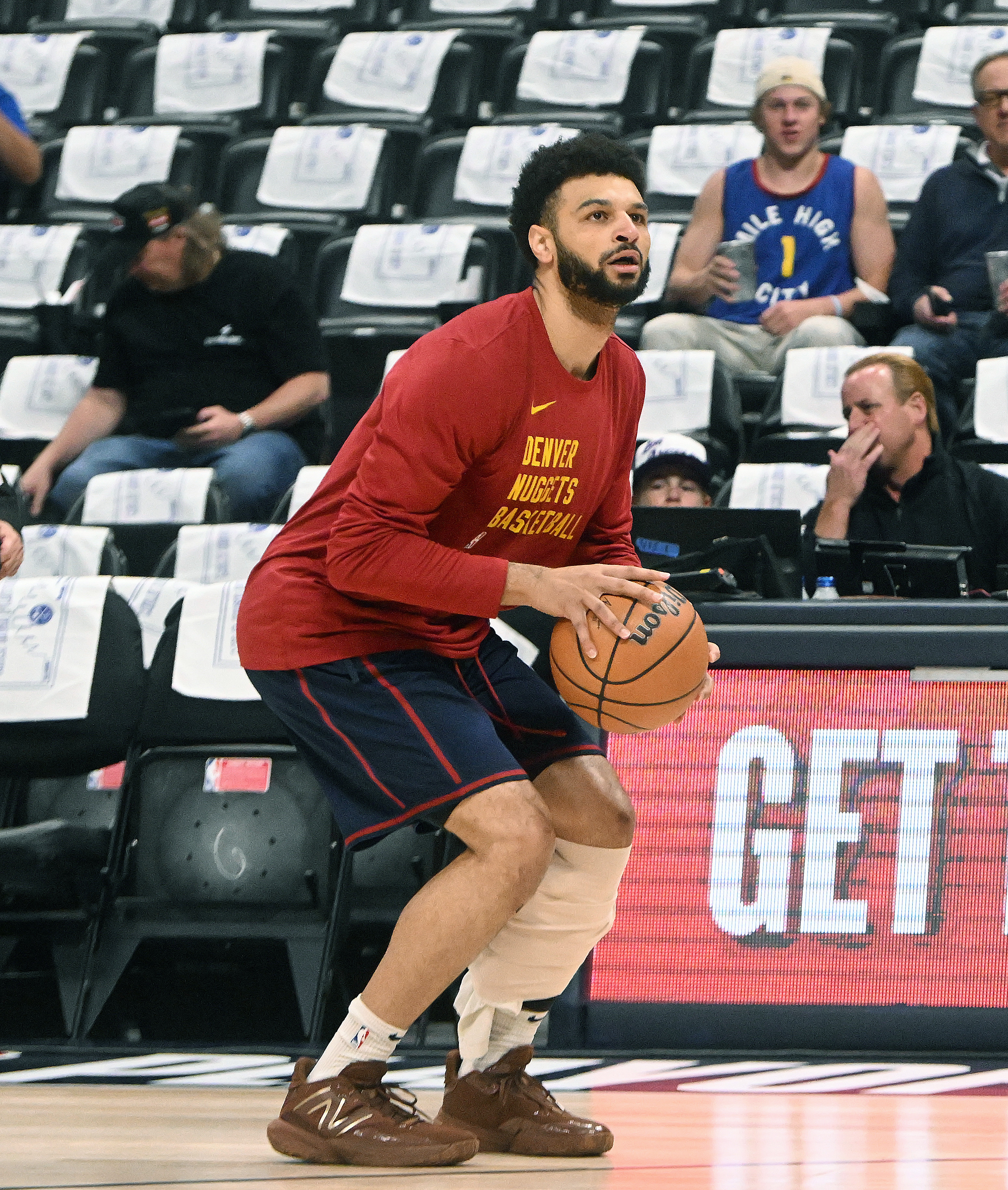 Jamal Murray warms up with his leg wrapped before the game when he was still questionable for game 5 against the Lakers at Ball Arena on Monday, April 29, 2024. (Photo by Jerilee Bennett, The Gazette)