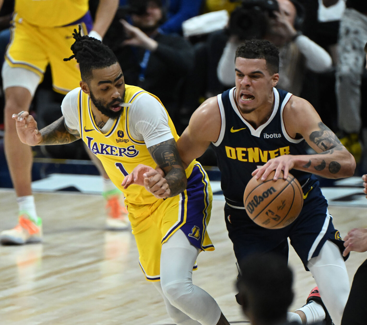 Michael Porter, Jr. steals the ball from Lakers’ D’Angelo Russell during the third quarter of game 5 of the first round of the Western Conference championships on Monday, April 29, 2024. (Photo by Jerilee Bennett, The Gazette)
