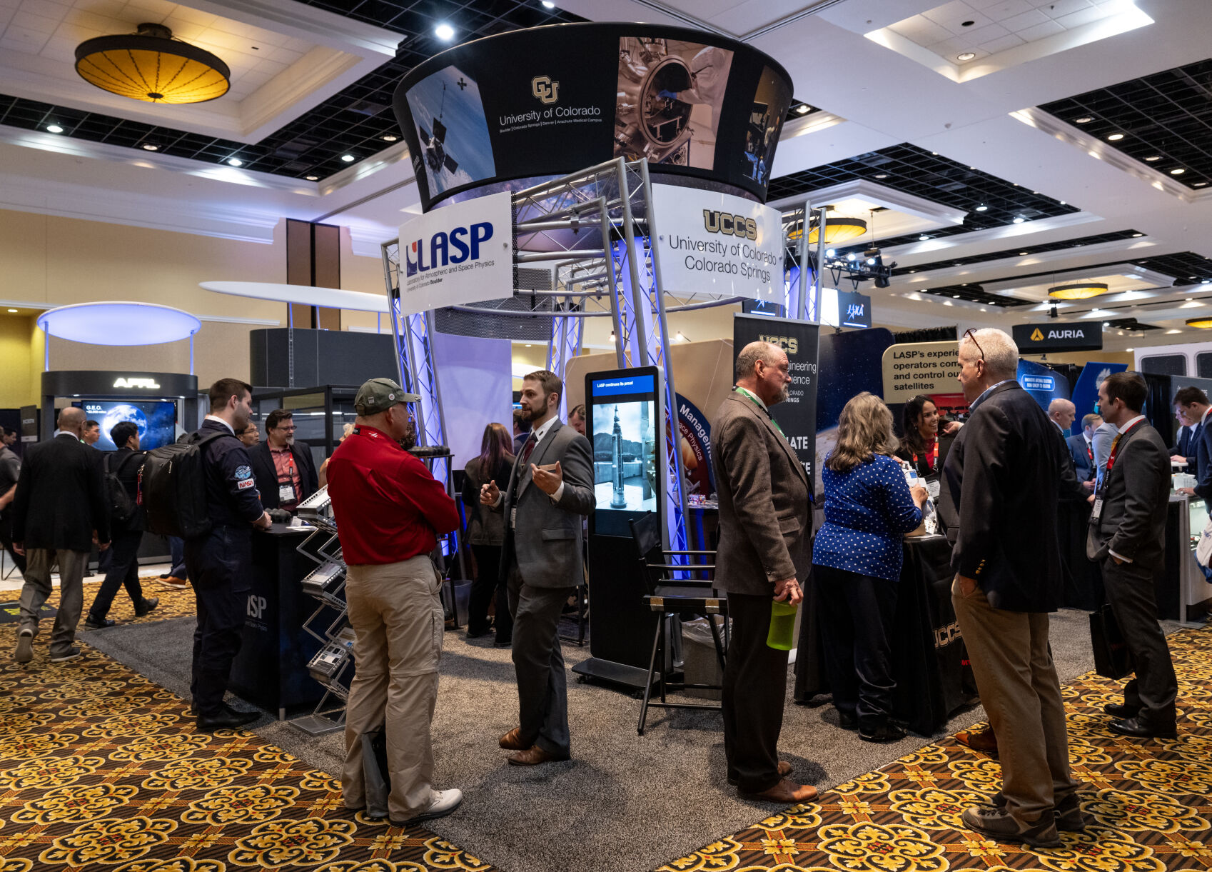 The University of Colorado Colorado Springs’ booth at the 39th Space Foundation Space Symposium at The Broadmoor Hotel, Tuesday, April 9, 2024, in Colorado Springs, Colo. (Parker Seibold, The Gazette) (Parker Seibold)