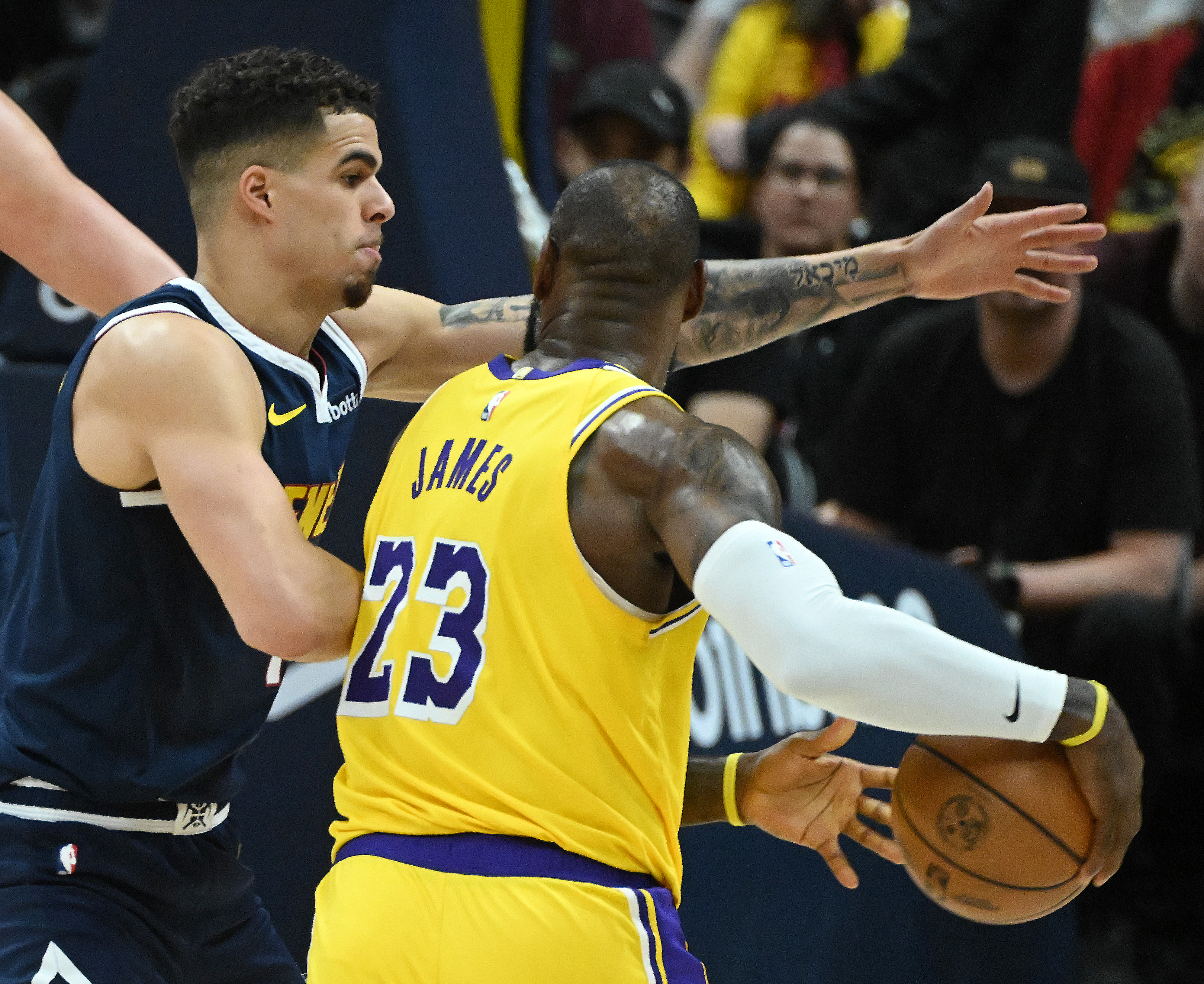 Michael Porter, Jr. defends Lakers’ LeBron James during game 5 of the first round of the Western Conference championships at Ball Arena on Monday, April 24, 2024. The Nuggets won the game 108-106. (Photo by Jerilee Bennett, The Gazette)