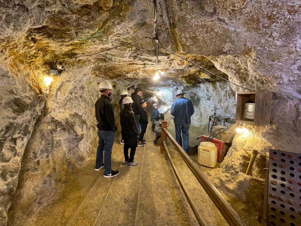 A group gets a tour of the Mollie Kathleen Gold Mine. (Spencer McKee, Out There Colorado)