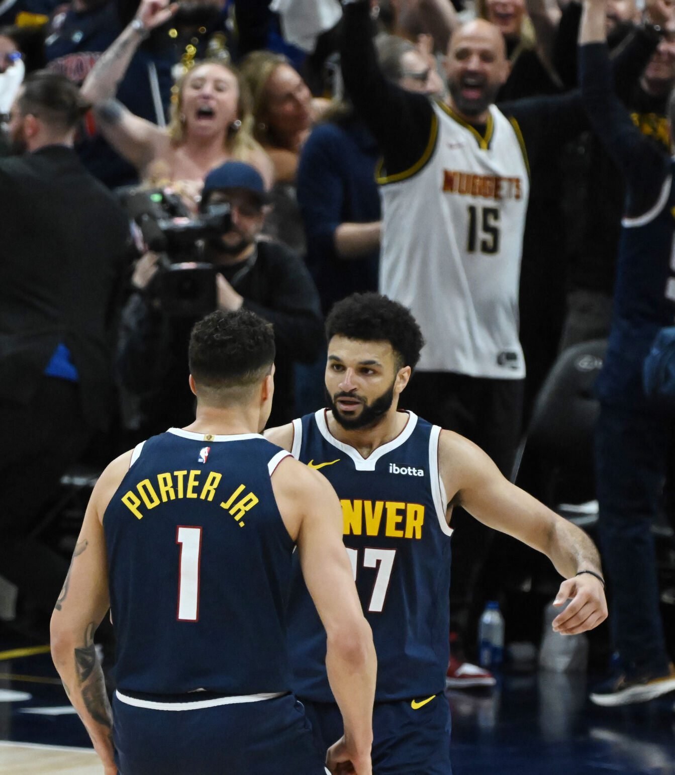 Jamal Murray celebrates with Michael Porter, Jr. after defeating the Lakers 108-106 in game 5 of round 1 of the Western Conference championships on Monday, April 29, 2024. (Photo by Jerilee Bennett, The Gazette)
