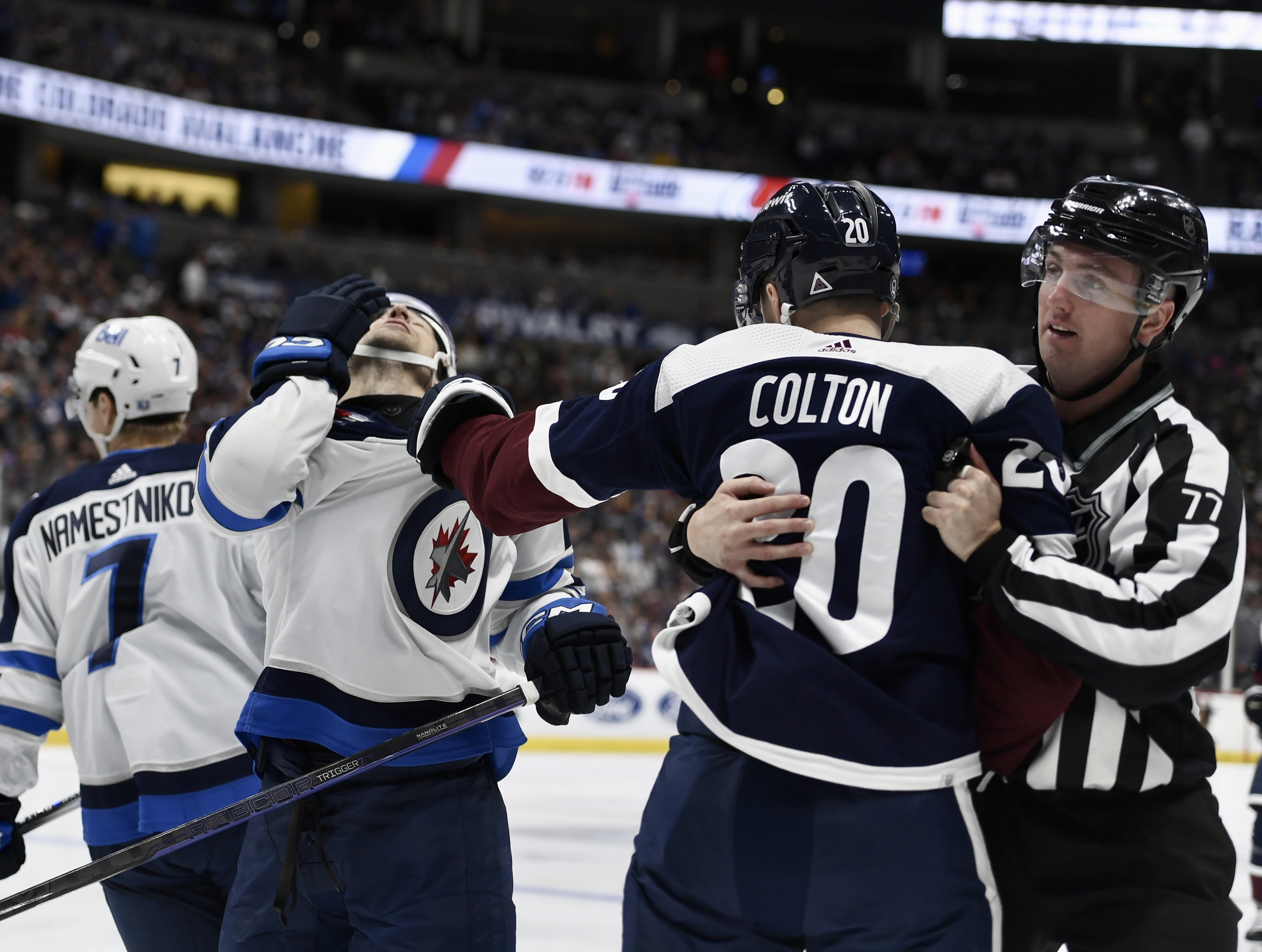 Avs forward Ross Colton punches Winnipeg's Neal Pionk on Saturday, April 13, 2024. (CarsonFieldcarson.field@gazette.comhttps://secure.gravatar.com/avatar/c524ef3d384945349bed78d70eb2d2cd?d=mm&r=g)