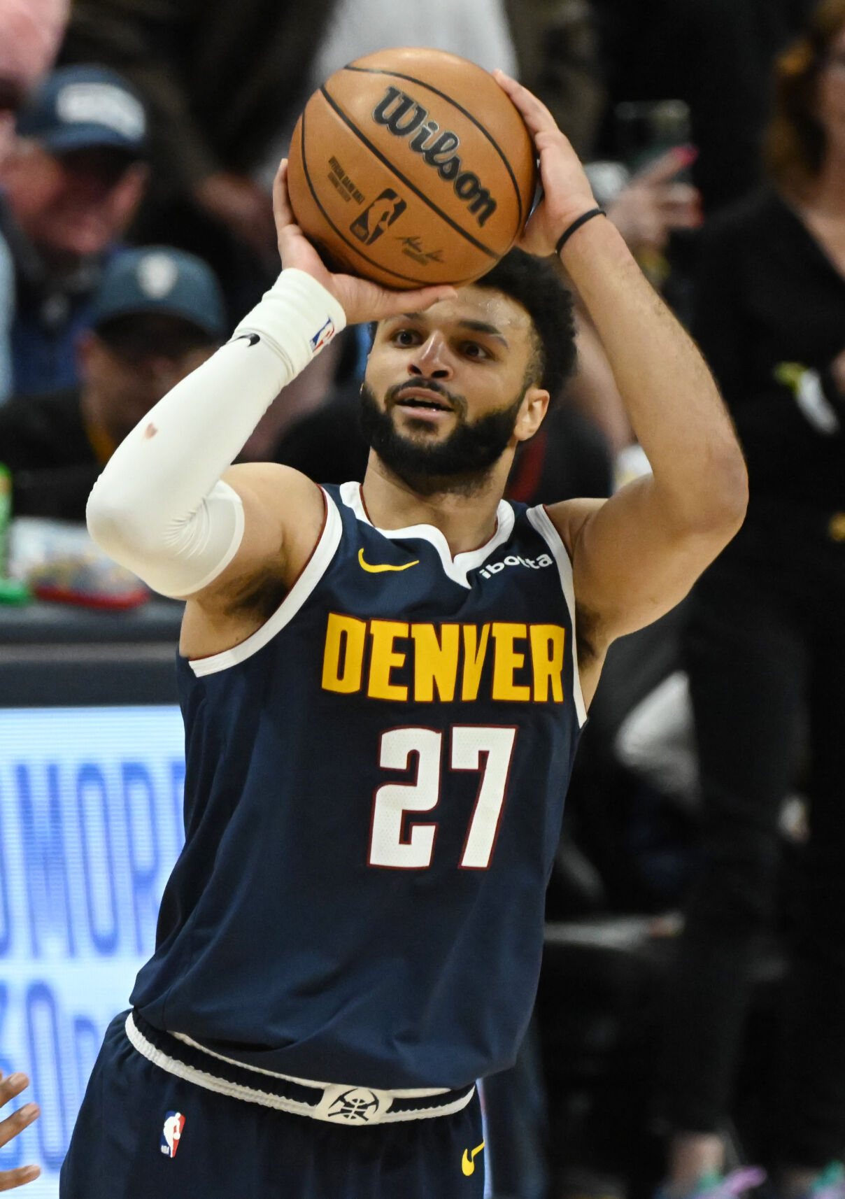 Jamal Murray shoots a three-pointer in the final minutes of the game of the Western Conference championships on Monday, April 29, 2024. The Nuggets will be meeting the Timberwolves in the second round. (Photo by Jerilee Bennett, The Gazette)