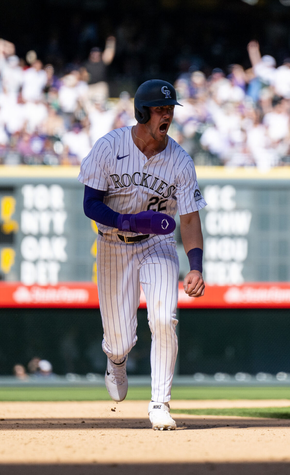 Colorado Rockies outfielder Nolan Jones (22) cheers as he runs home after Kris Bryant (23) hit a home run against the Tampa Bay Rays at Coors Field, Friday, April 5, 2024, in Denver, Colo. (Parker Seibold, The Gazette) (Parker Seibold)