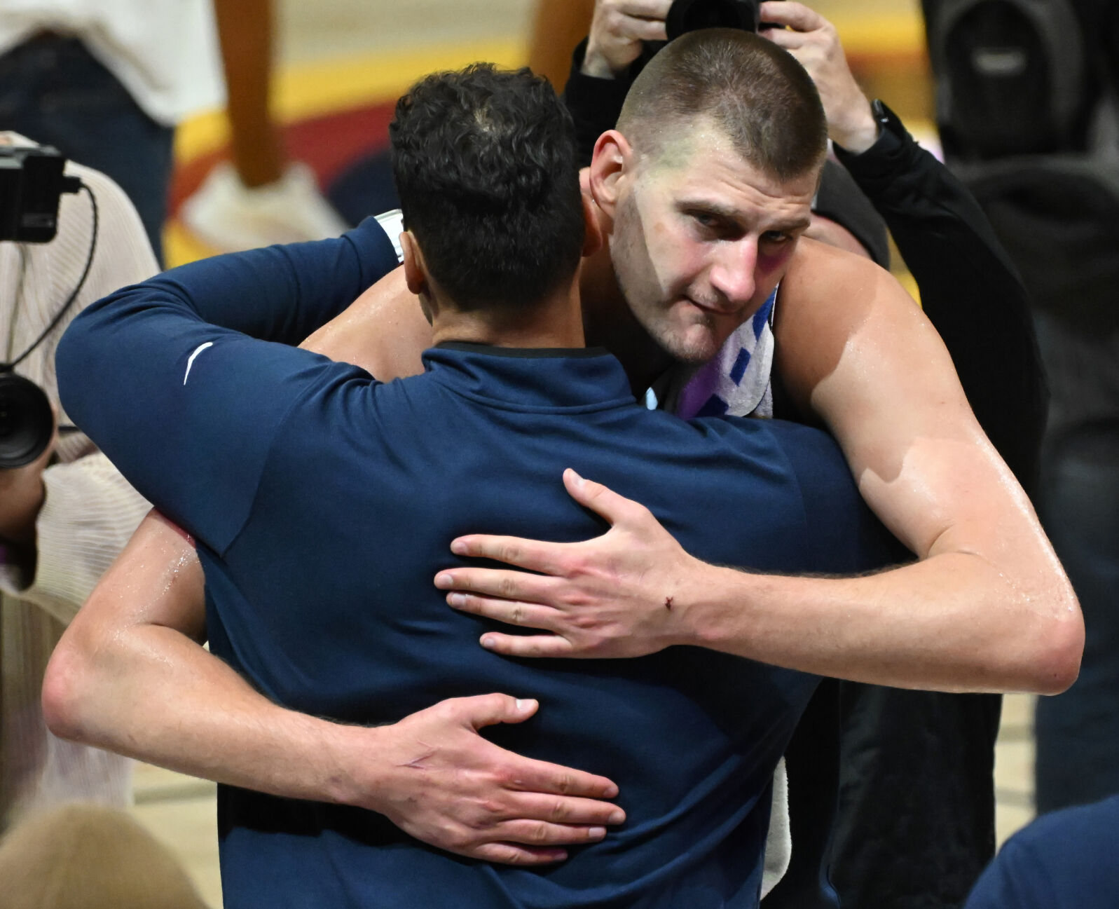 Nikola Jokic embraces conditioning coach Felipe Eichenberger game 5 of the first round of the Western Conference championships at Ball Arena on Monday, April 24, 2024. The Nuggets won the game 108-106. (Photo by Jerilee Bennett, The Gazette)
