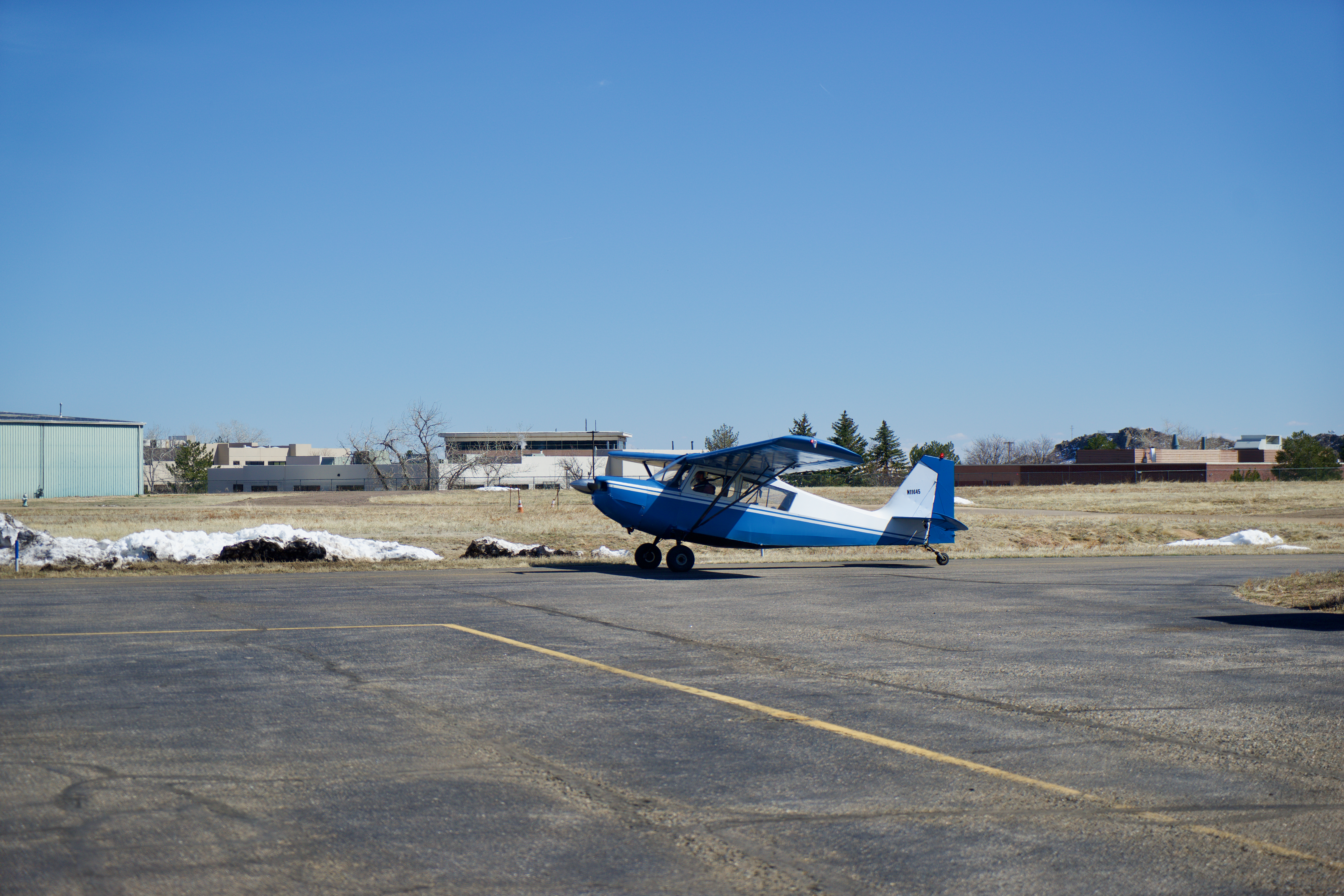 A small aircraft taxis away from hangars at the Boulder Municipal Airport. Aircraft such as this have prompted many residents to circulate and sign a petition calling for the airport's closure, as they fear lead contamination from fuel and worry about the impact of noise. (Alex Edwards/The Denver Gazette) (AlexanderEdwardsBusiness Reporteralex.edwards@gazette.comhttps://secure.gravatar.com/avatar/dbaa50cc8a9183e280c297e3afa72ace?d=mm&r=g)