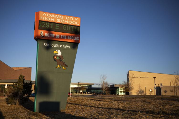111121-news-AdamsCityHSMug02.JPG