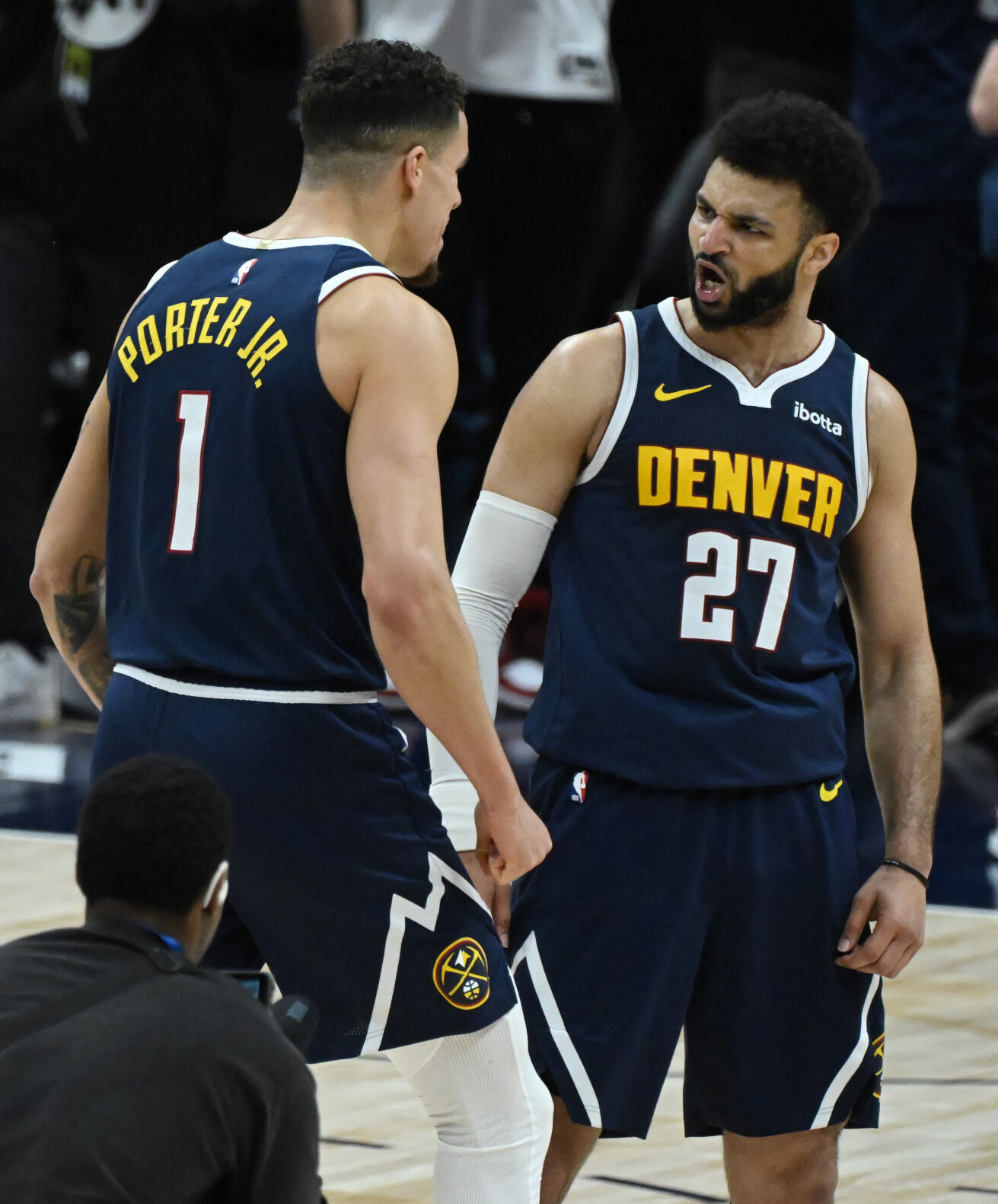 Michael Porter, Jr. and Jamal Murray celebrate after winning game 5 against the Lakers 108-106 and the first round of the Western Conference championships on Monday, April 29, 2024. The Nuggets will be meeting the Timberwolves in the second round. (Photo by Jerilee Bennett, The Gazette)