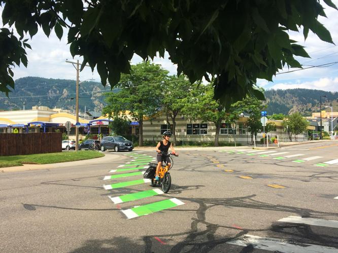 Person riding an e-bike in Boulder (copy)
