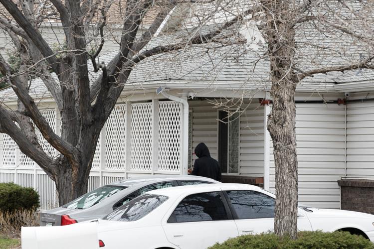 A worker helps reinforce lattice barriers (copy)