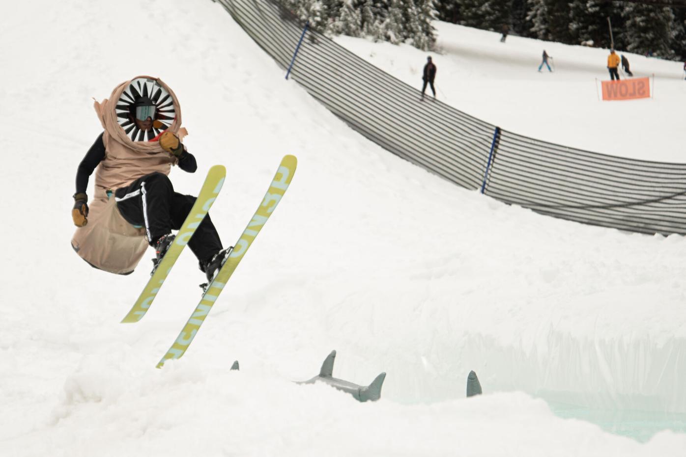 Teams competing in the three-leg pond skim challenge wore matching costumes