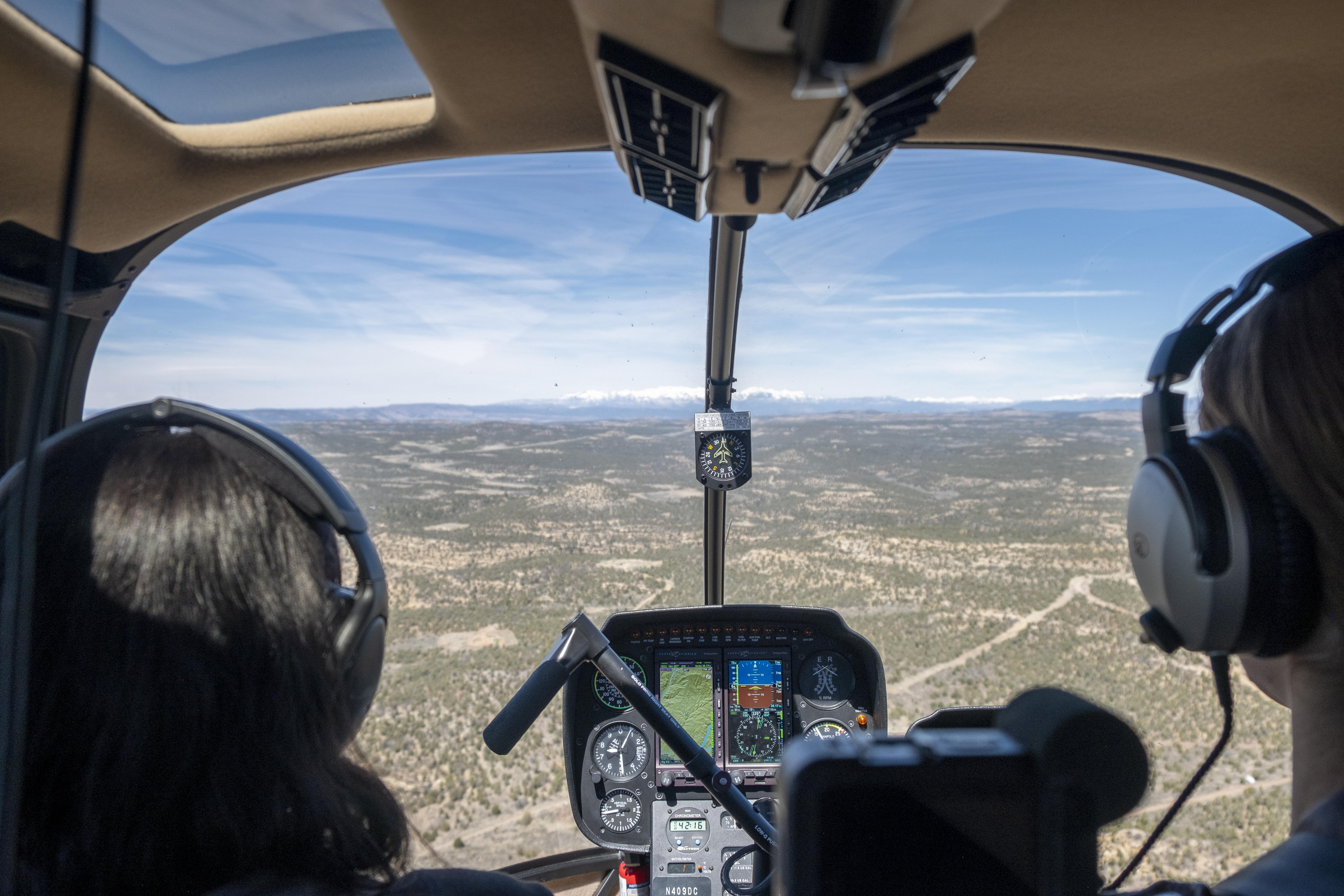 Valerie Arcara, right, pilots a helicopter with flight instructor Sierra Gray during an instrument practice flight between Animas Air Park Airport and Navajo Lake, New Mexico on Thursday, April 4, 2024 in Durango, Colorado. (JonathanIngrahamDigital Strategistjonathan.ingraham@denvergazette.comhttps://denvergazette.com/content/tncms/avatars/c/dd/7f0/cdd7f086-b693-11ec-b373-bba598953eb6.fc0f5608a6f1144f64f080f771bd904d.png)