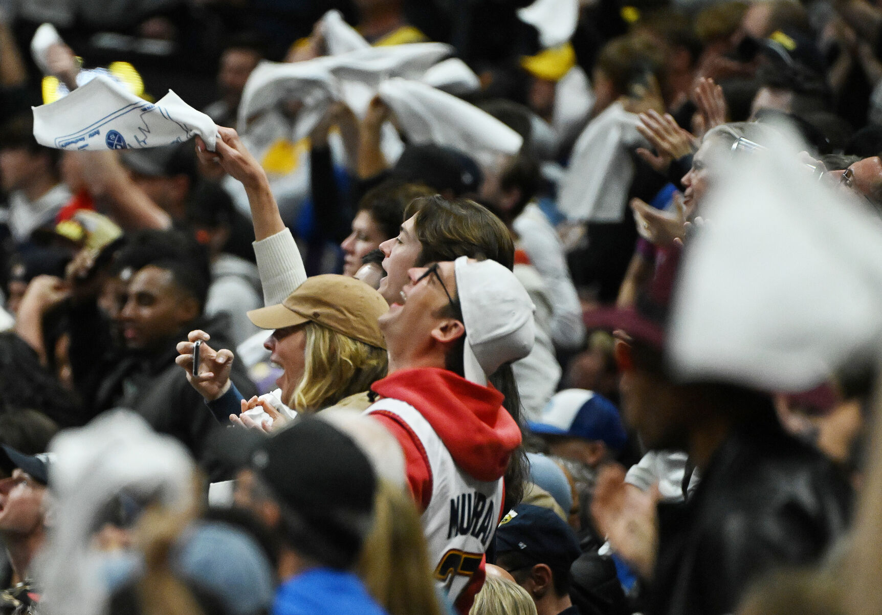 Fans go wild after the Nuggets take the lead during game 5 of the first round of the Western Conference championships at Ball Arena on Monday, April 24, 2024. The Nuggets won the game 108-106. (Photo by Jerilee Bennett, The Gazette)