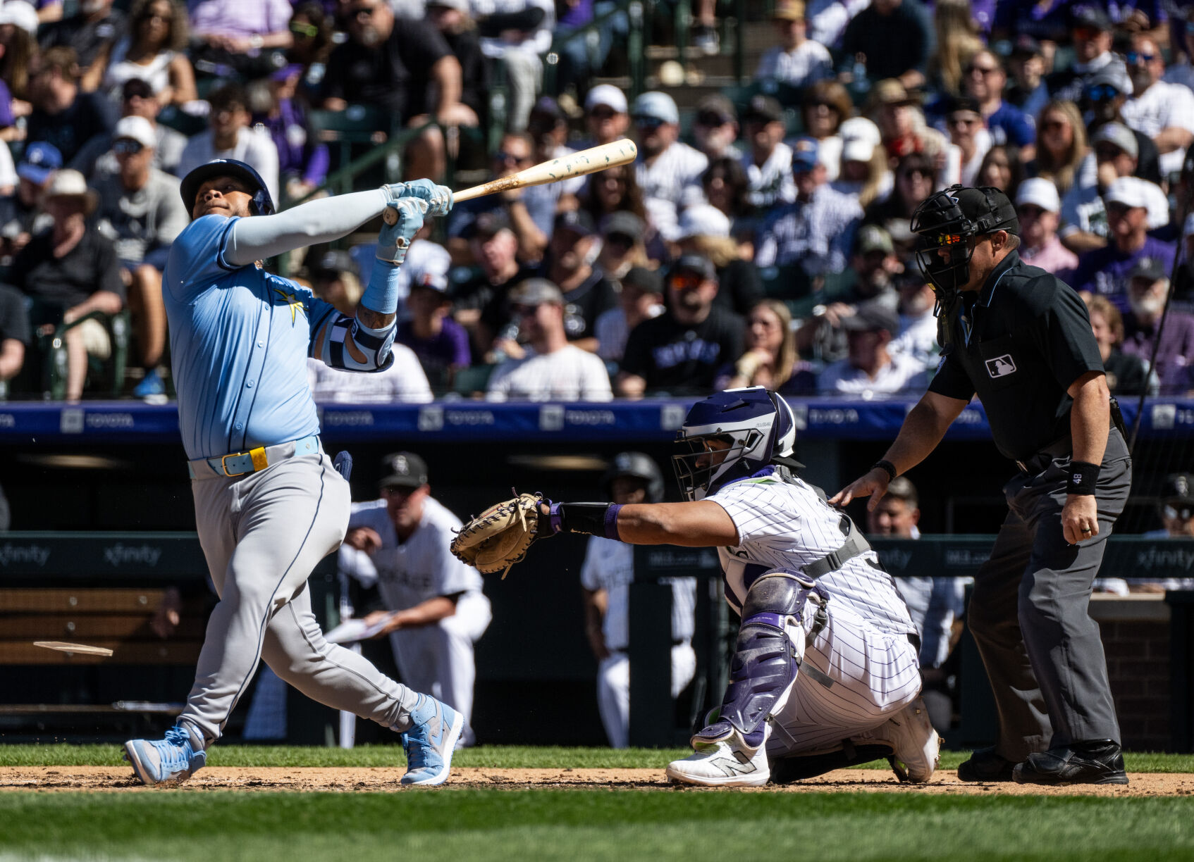 Colorado Rockies catcher Elias Díaz (35) catches the ball as Tampa Bay Rays outfielder Harold Ramírez’s (43) bat breaks at Coors Field, Friday, April 5, 2024, in Denver, Colo. (Parker Seibold, The Gazette) (Parker Seibold)