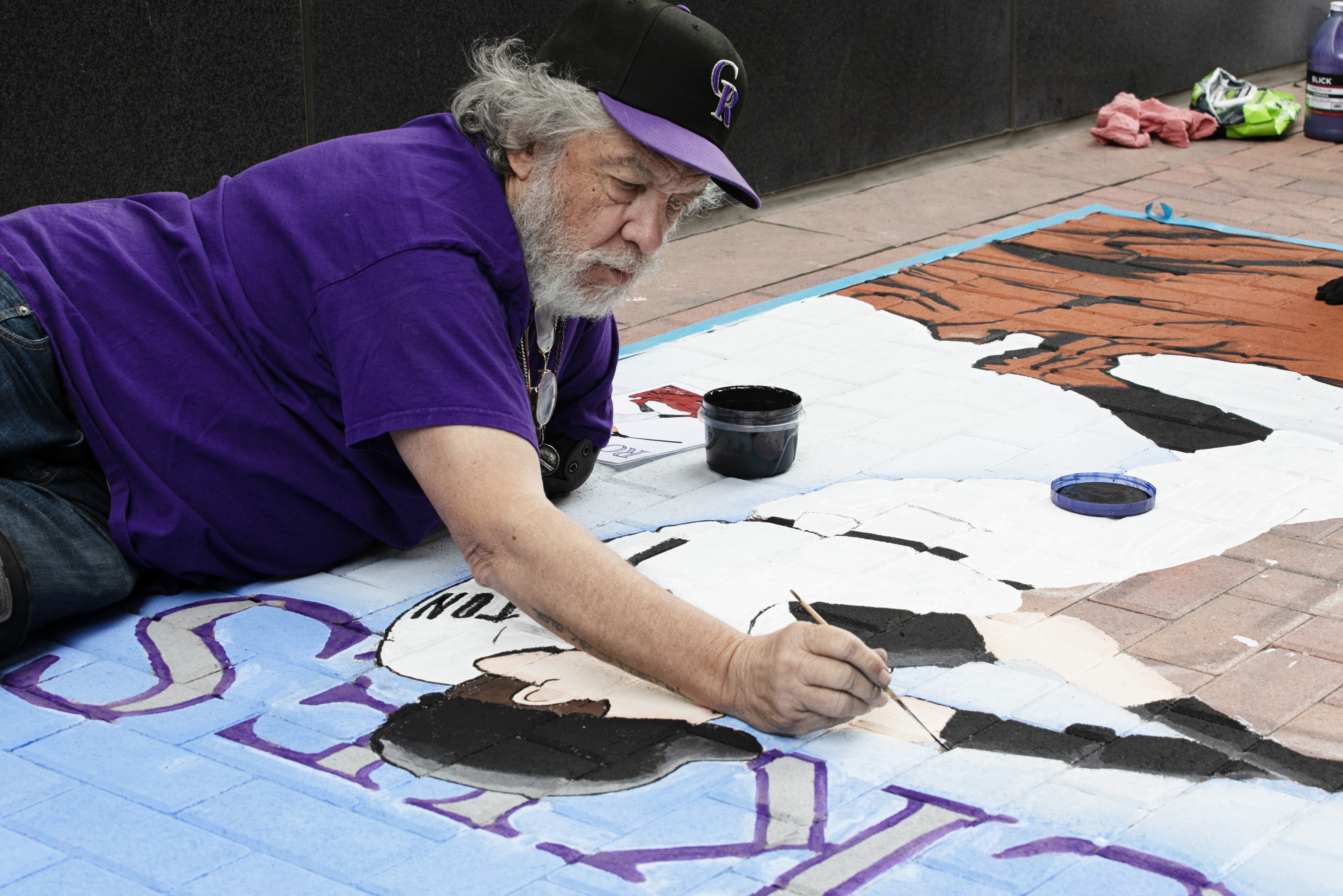Kyle Panister paints a portion of Todd Helton in a Rockies scene on the bricks of McGregor Square during the Rockies home opener on Friday, April 5, 2024 in Denver. Panister and a few other painters have been doing so for the past eleven years. The painting will last most of the year before it eventually fades away, to be painted over the following year. (TomHellauerMultimedia Producertom.hellauer@denvergazette.comhttps://denvergazette.com/content/tncms/avatars/f/9e/622/f9e6228a-3b6b-11ed-bf10-fbb71fa8e421.f54b911252c540f1d61709edc4727a39.png)