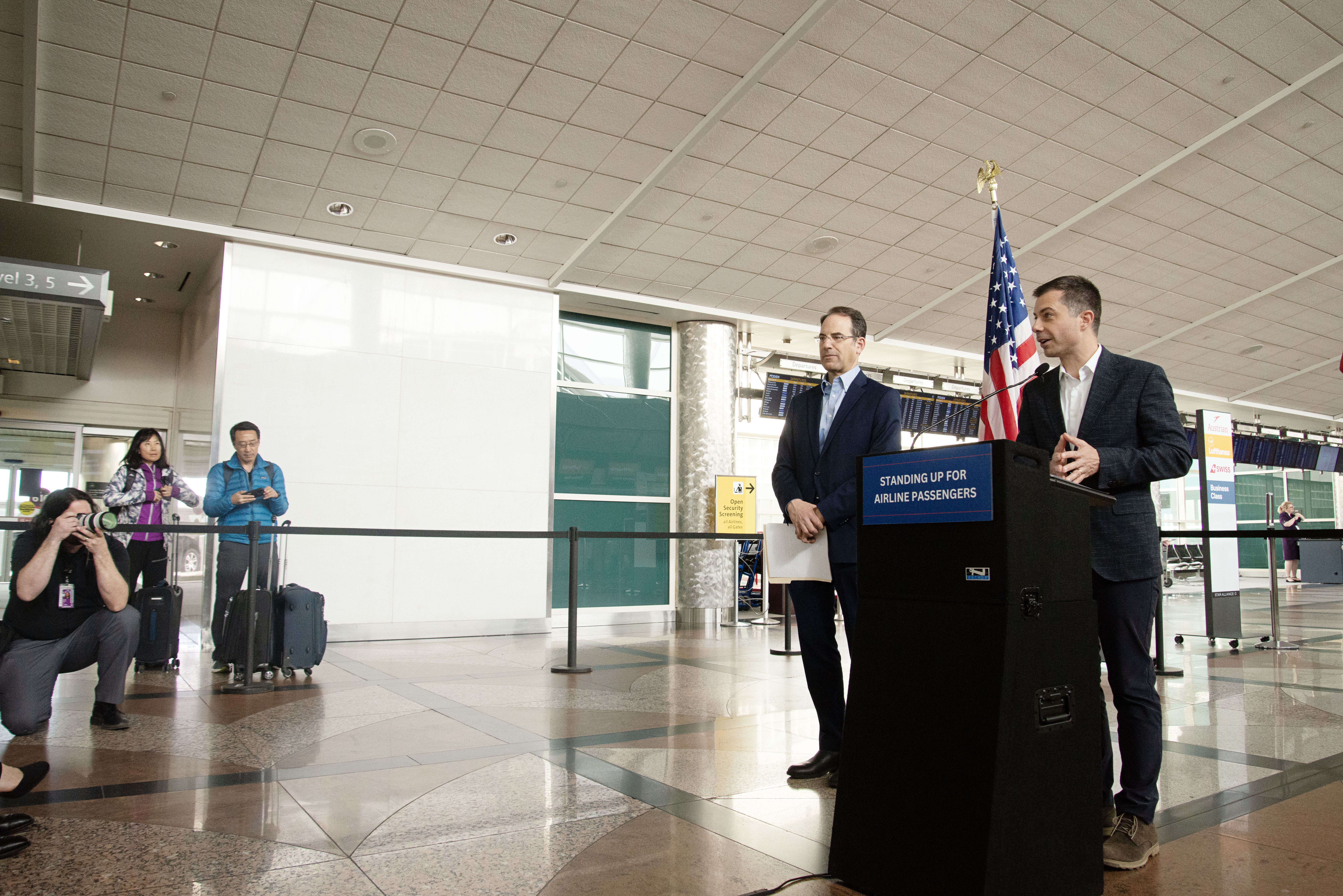 Passengers stop to listen to Colorado Attorney General Phil Weiser and U.S. Transportation Secretary Pete Buttigieg announce a partnership between state governments and the Dept. of Transportation to protect U.S. flyers from airline violations while at a press conference at Denver International Airport on Tuesday, April 16, 2024. (TomHellauerMultimedia Producertom.hellauer@denvergazette.comhttps://denvergazette.com/content/tncms/avatars/f/9e/622/f9e6228a-3b6b-11ed-bf10-fbb71fa8e421.f54b911252c540f1d61709edc4727a39.png)