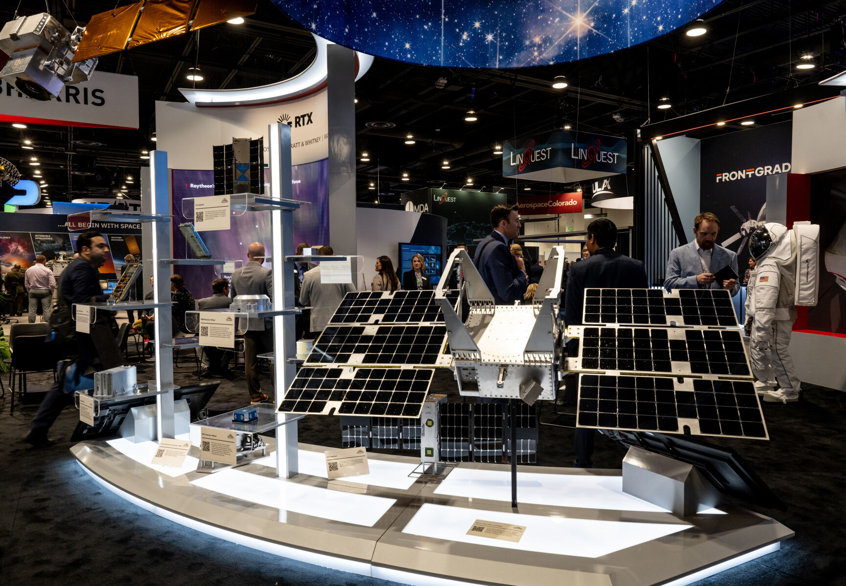 Satellites and equipment on display in the RTX exhibit at the 39th Space Foundation Space Symposium at The Broadmoor Hotel, Tuesday, April 9, 2024, in Colorado Springs, Colo. (Parker Seibold, The Gazette) (ParkerSeiboldparker.seibold@gazette.comhttps://secure.gravatar.com/avatar/b5a9c1795b3aa1497ffa7824b99c1d26?d=mm&r=g)