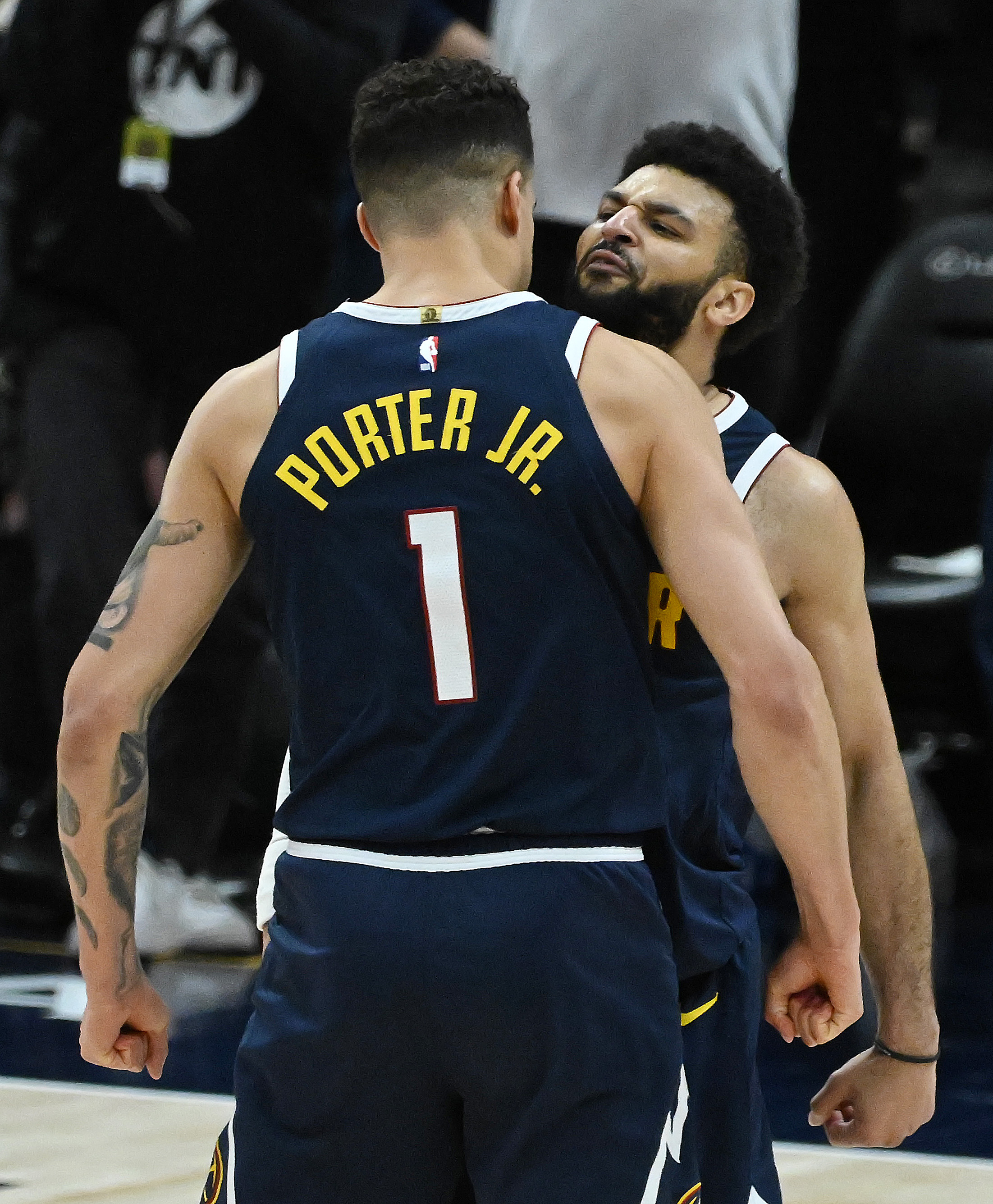 Michael Porter, Jr. and Jamal Murray chest bump after winning game 5 against the Lakers 108-106 and the first round of the Western Conference championships on Monday, April 29, 2024. The Nuggets will be meeting the Timberwolves in the second round. (Photo by Jerilee Bennett, The Gazette)