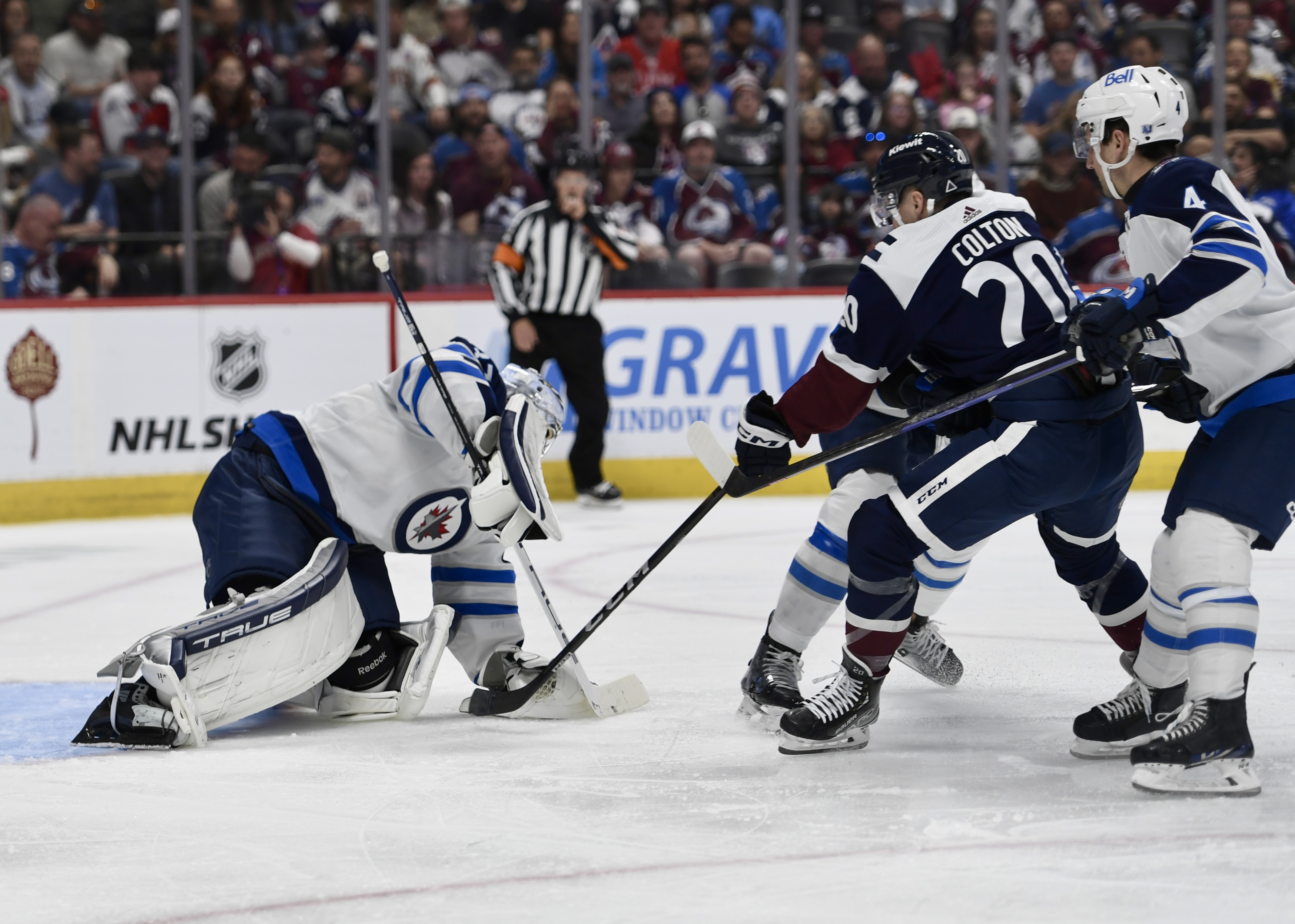 Winnipeg goalie Connor Hellebuyck stops a shot from Avs forward Ross Colton on Saturday, April 13, 2024. (CarsonFieldcarson.field@gazette.comhttps://secure.gravatar.com/avatar/c524ef3d384945349bed78d70eb2d2cd?d=mm&r=g)
