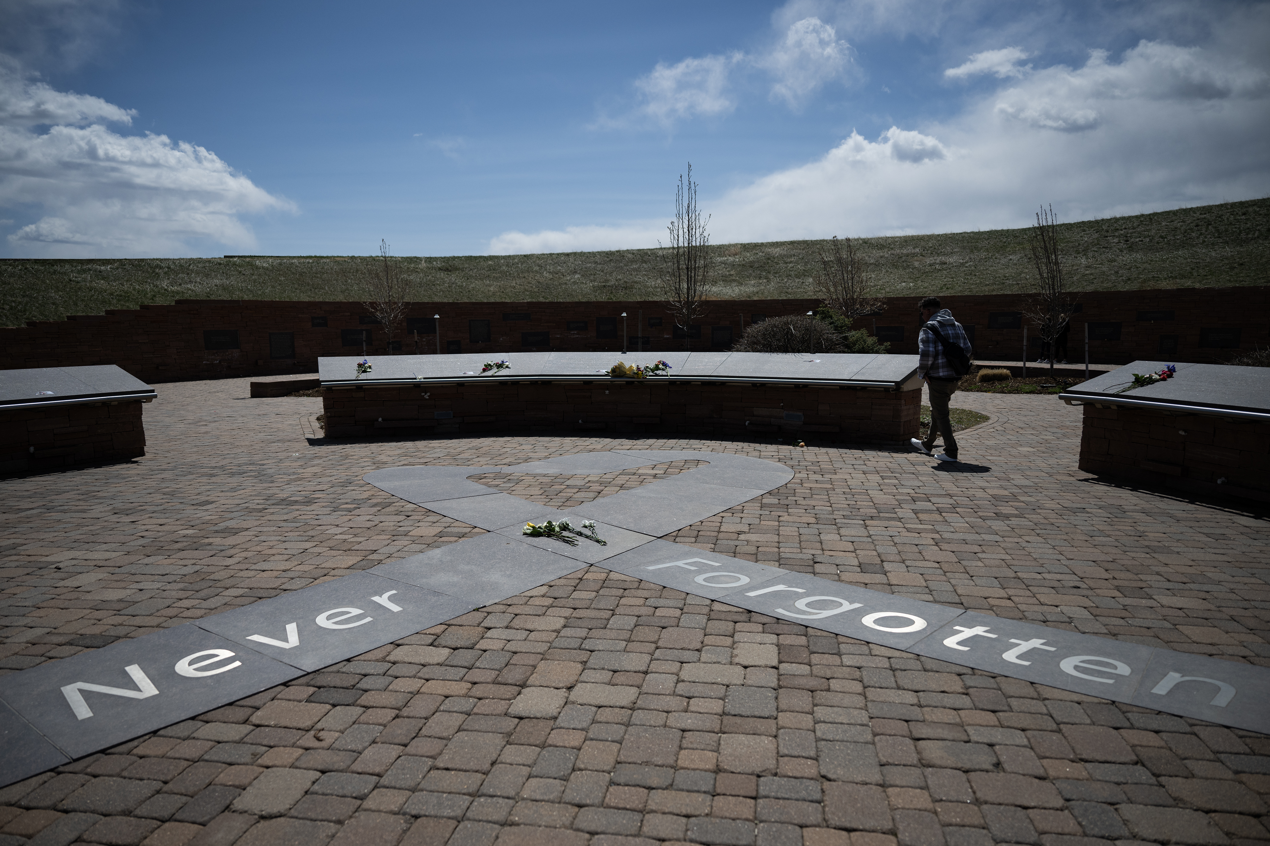 FILE PHOTO: Will Saggau, a 2001 graduate of Columbine High School who was present during the 1999 mass shooting, visits the Columbine Memorial on Thursday, April 20, 2023, in Robert F. Clement Park in Littleton, Colo. (Timothy Hurst/Denver Gazette) (TimHursttim.hurst@gazette.comhttps://secure.gravatar.com/avatar/aca82bd62b4ee425c598527cd6faa1b1?d=mm&r=g)