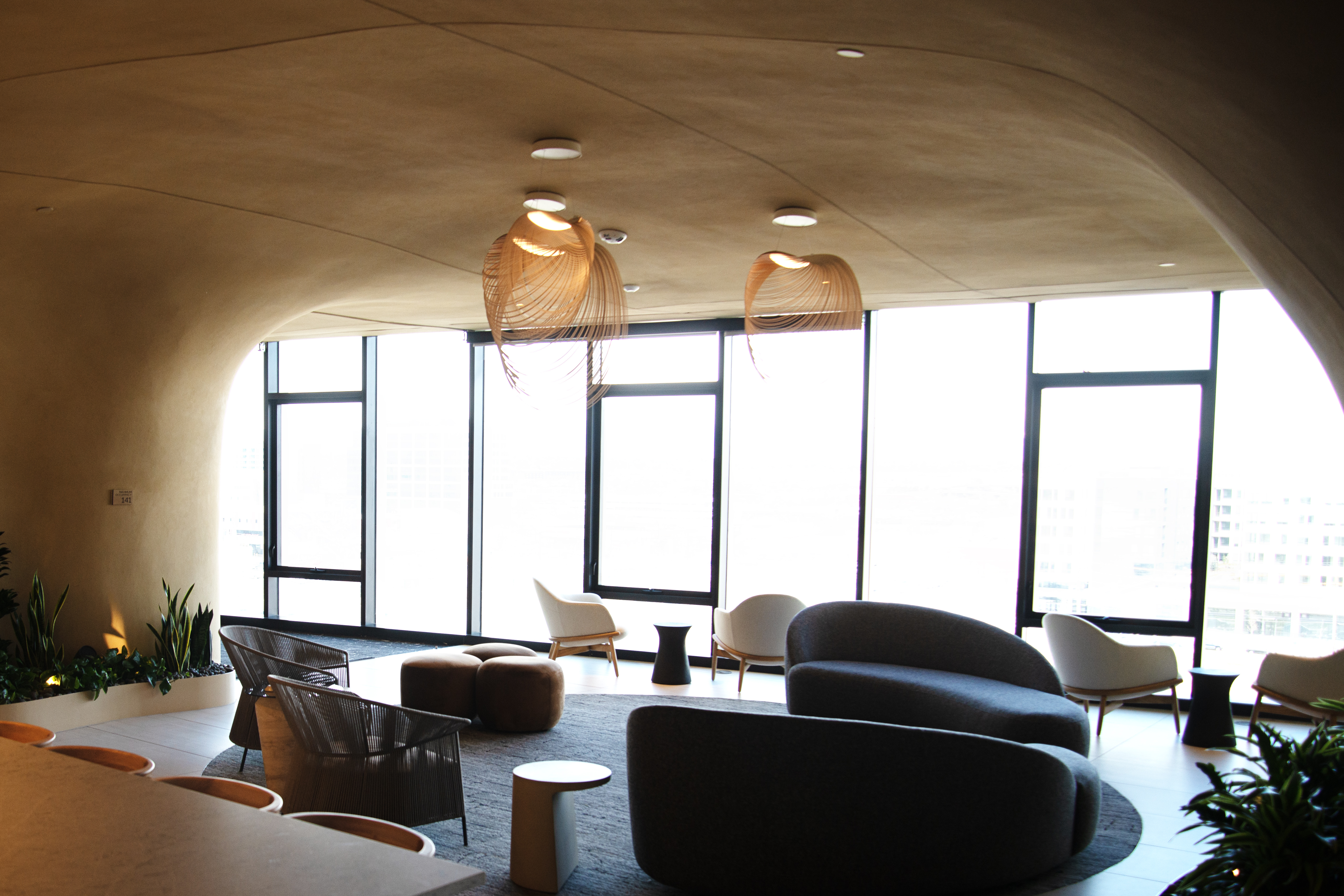 A gathering room for residents in One River North features a view of the Rocky Mountains and Denver as seen on Tuesday, April 23, 2024. (TomHellauerMultimedia Producertom.hellauer@denvergazette.comhttps://denvergazette.com/content/tncms/avatars/f/9e/622/f9e6228a-3b6b-11ed-bf10-fbb71fa8e421.f54b911252c540f1d61709edc4727a39.png)