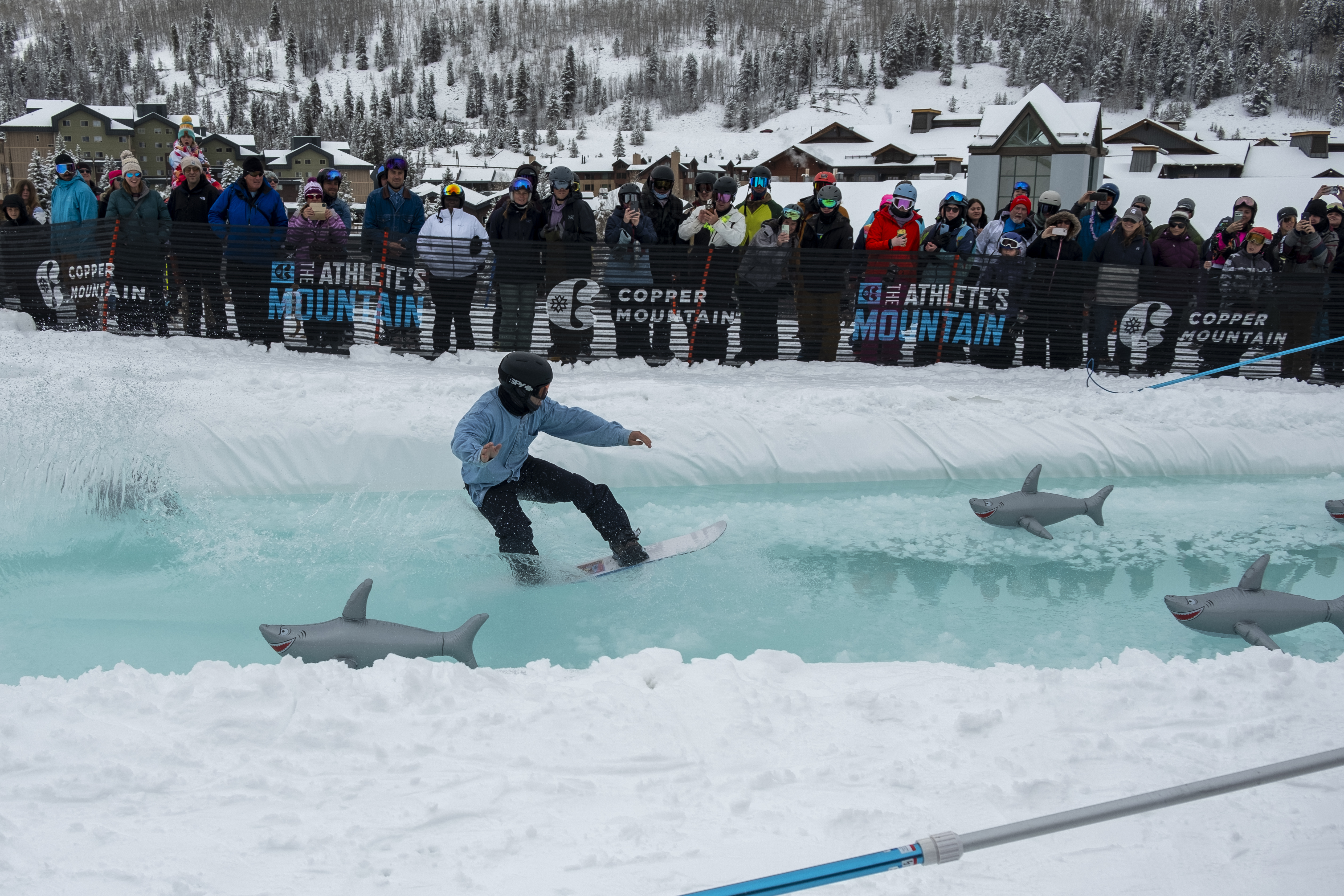 A snowboarder snowboards across 'shark-infested waters' of the pond skim section at the 2nd annual Slush Rush Saturday, April 27, 2024 at Copper Mountain Resort in Copper Mountain, Colorado. (JonathanIngrahamDigital Strategistjonathan.ingraham@denvergazette.comhttps://denvergazette.com/content/tncms/avatars/c/dd/7f0/cdd7f086-b693-11ec-b373-bba598953eb6.fc0f5608a6f1144f64f080f771bd904d.png)