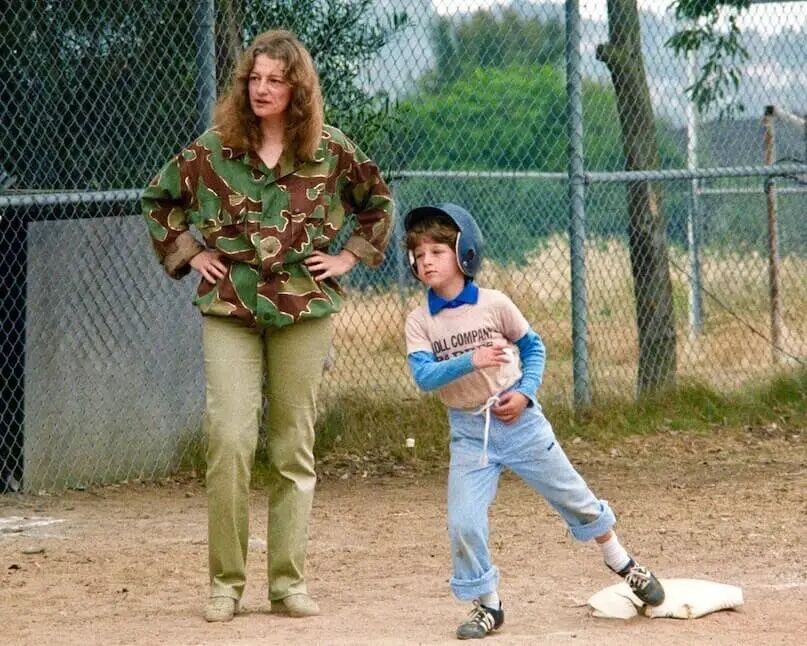Susan Polis Schutz coaches third base in a baseball game with her son, future Colorado Gov. Jared Polis. 
