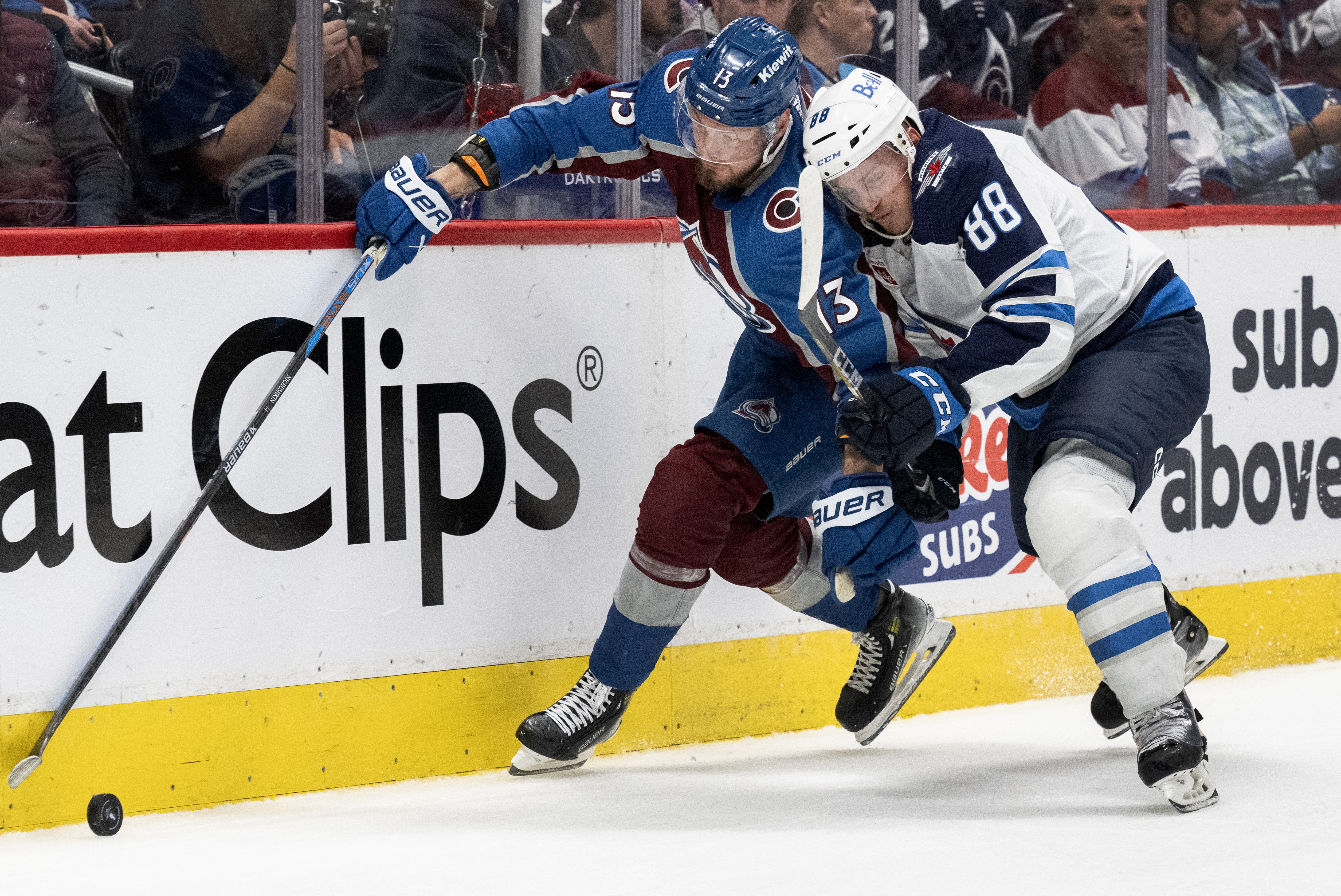 Colorado Avalanche right wing Valeri Nichushkin (13) fights off Winnipeg Jets defenseman Nate Schmidt (88) for the puck during the third period in Game 4 of an NHL Stanley Cup first-round playoff series Sunday, April 28, 2024, at Ball Arena in Denver. The Avalanche won 5-1 to take a 3-1 advantage in the series. (The Gazette, Christian Murdock) (Christian Murdock/The Gazette)