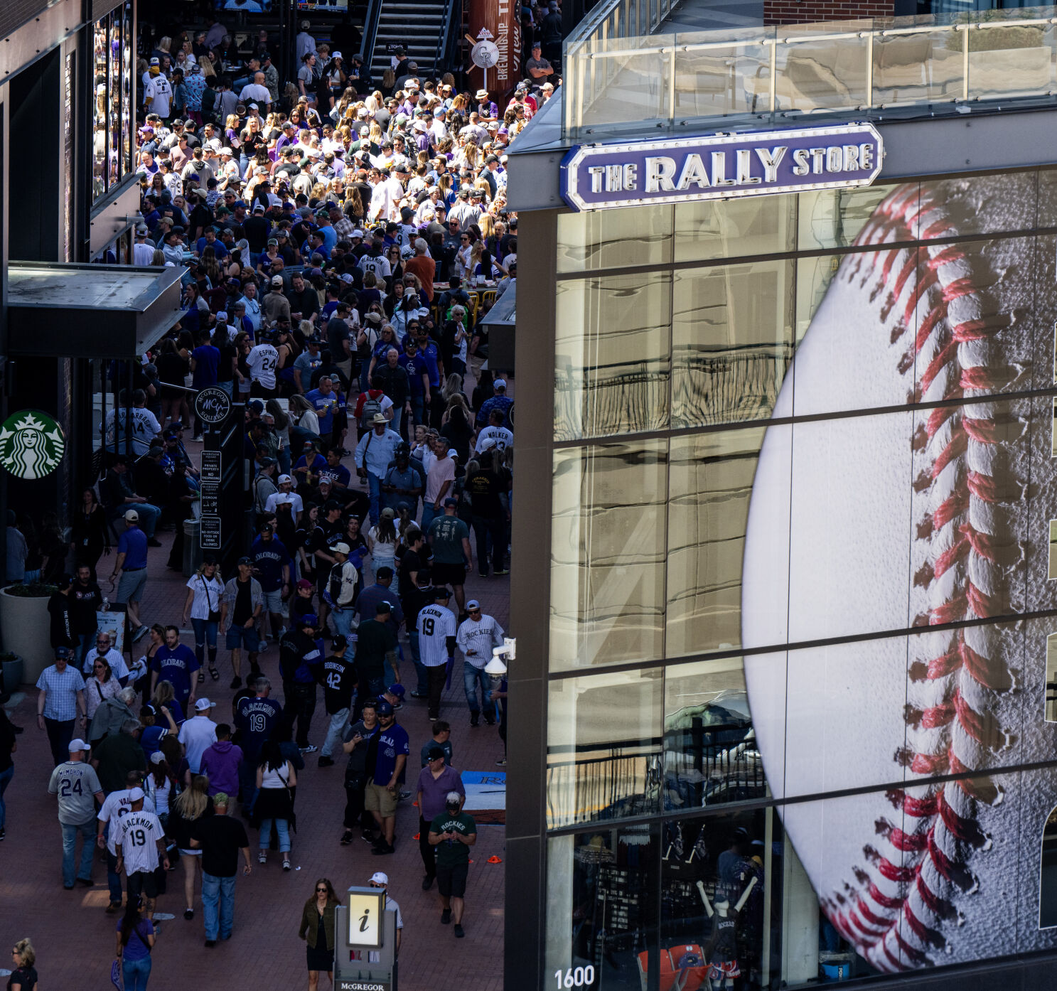 People pack into McGregor Square across from Coors Field for the Colorado Rockies opening day, Friday, April 5, 2024, in Denver, Colo. (Parker Seibold, The Gazette) (Parker Seibold)