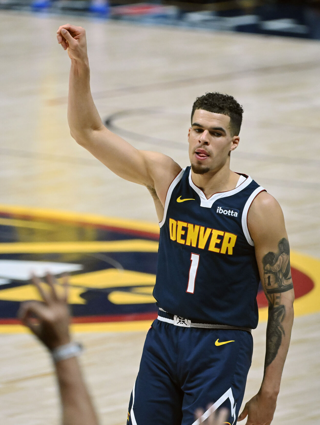 Michael Porter, Jr. celebrates a three pointer during game 5 of the first round of the Western Conference championships at Ball Arena on Monday, April 24, 2024. The Nuggets won the game 108-106. (Photo by Jerilee Bennett, The Gazette)